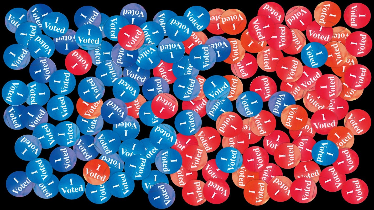 Several red and blue "I voted" stickers across a black background. The blue stickers are on the left and the red stickers are on the right