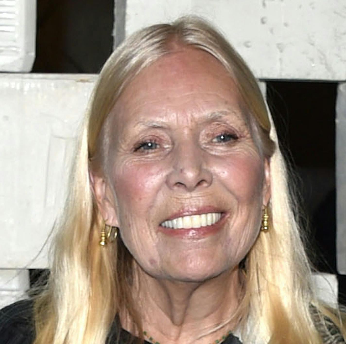 FILE - In this Oct. 11, 2014 file photo, Joni Mitchell arrives to the Hammer Museum's "Gala In The Garden," in Los Angeles. Mitchell&#x2019;s friend and conservator says it was an aneurysm that sent the folk singer to the hospital in March 2015. Conservator Leslie Morris acknowledged the aneurysm in a statement posted on Mitchell&#x2019;s website on Sunday, June 28, 2015, providing the first significant details on Mitchell&#x2019;s health status in the months since an ambulance was sent to her L