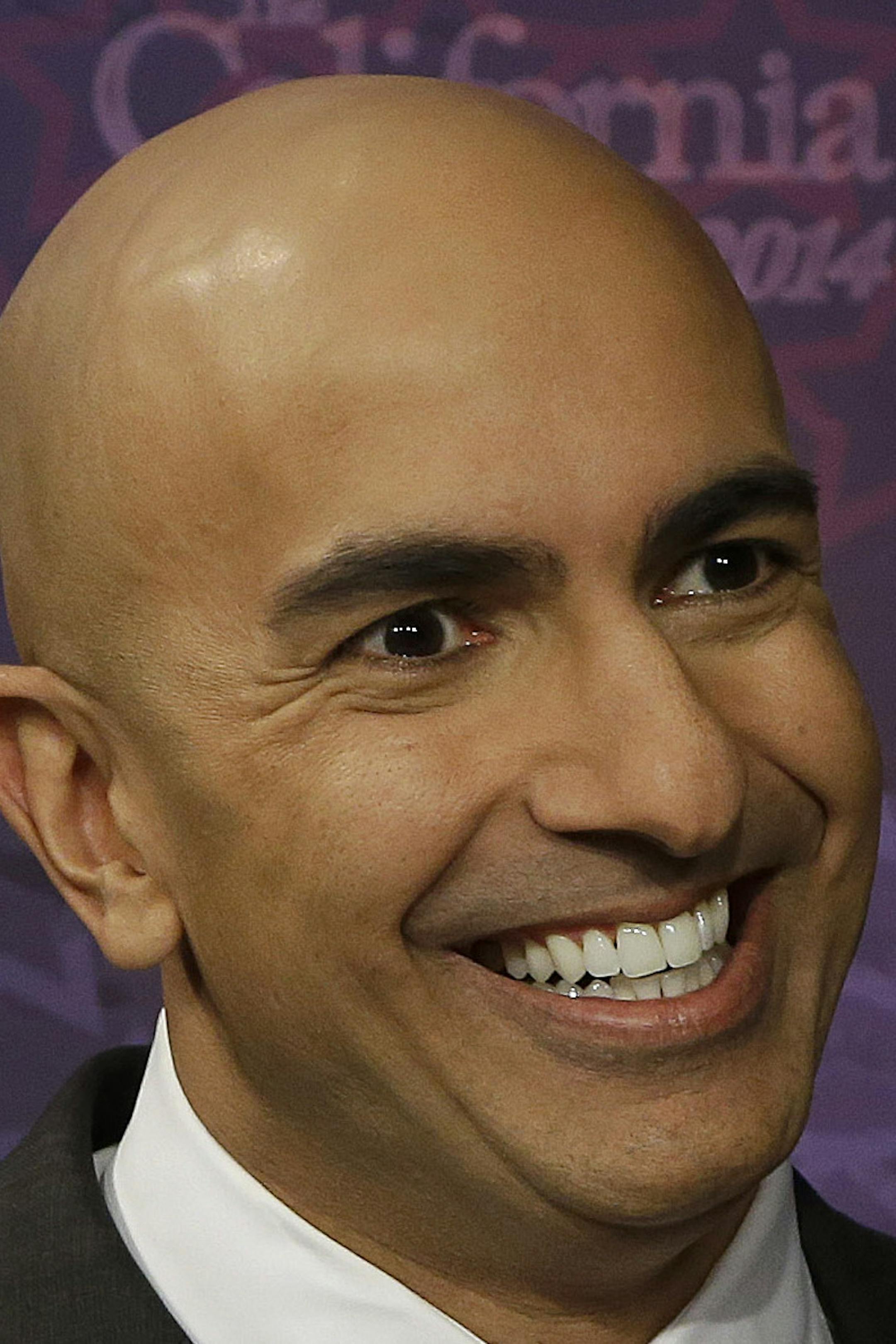 Republican challenger Neel Kashkari smiles before participating in a gubernatorial debate with Gov. Jerry†Brown in Sacramento, Calif., Thursday, Sept. 4, 2014. Thursday's debate is likely to be the only one of the general election. (AP Photo/Rich Pedroncelli, Pool)