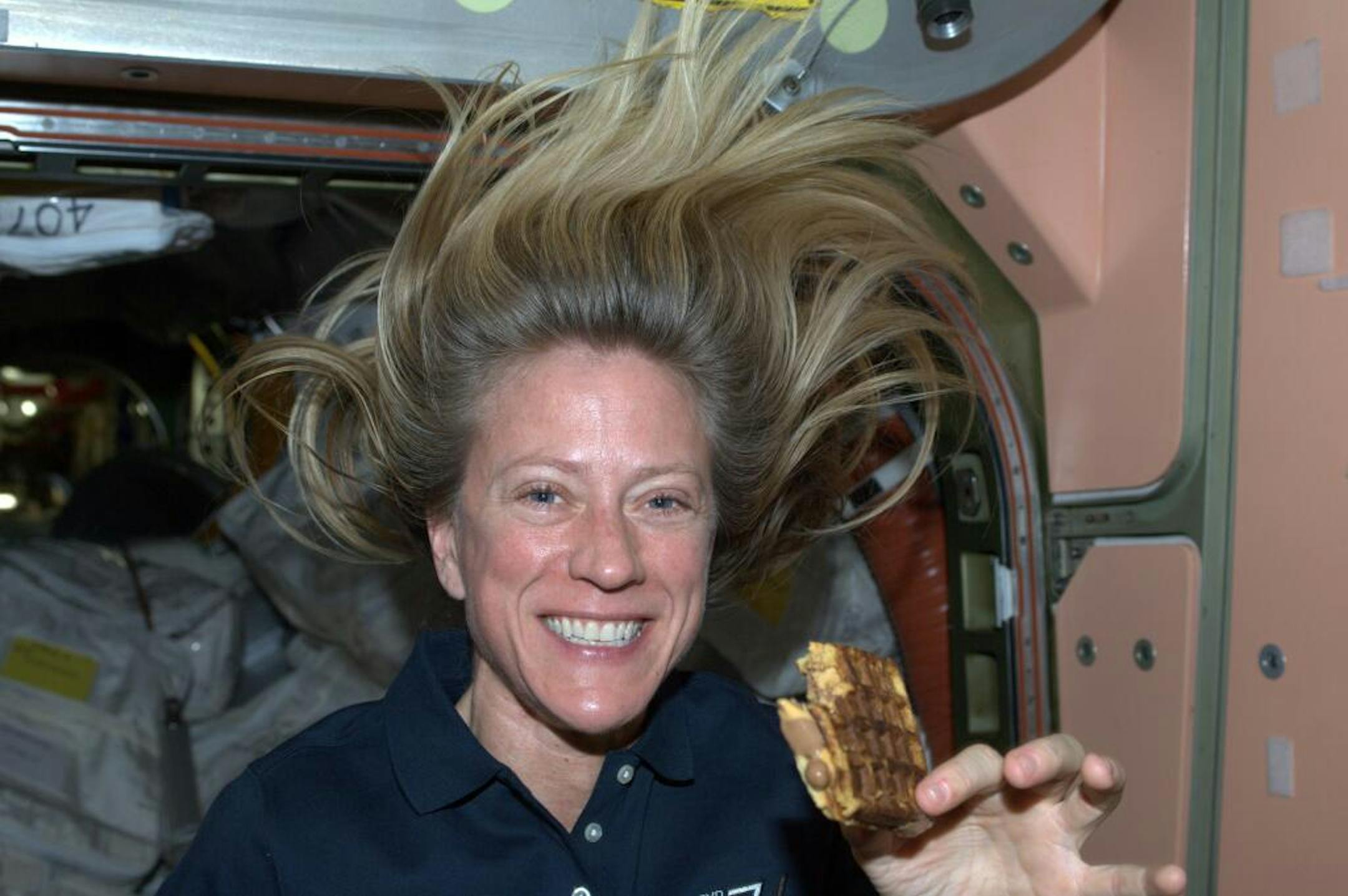 Minnesota astronaut and current Space Station resident Karen Nyberg, showing off her peanut butter and chocolate waffle sandwich.