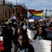 Demonstrators march to the Sandburg Education Center in Anoka during a Youth for Unity rally and march before Monday's Anoka-Hennepin school board mee