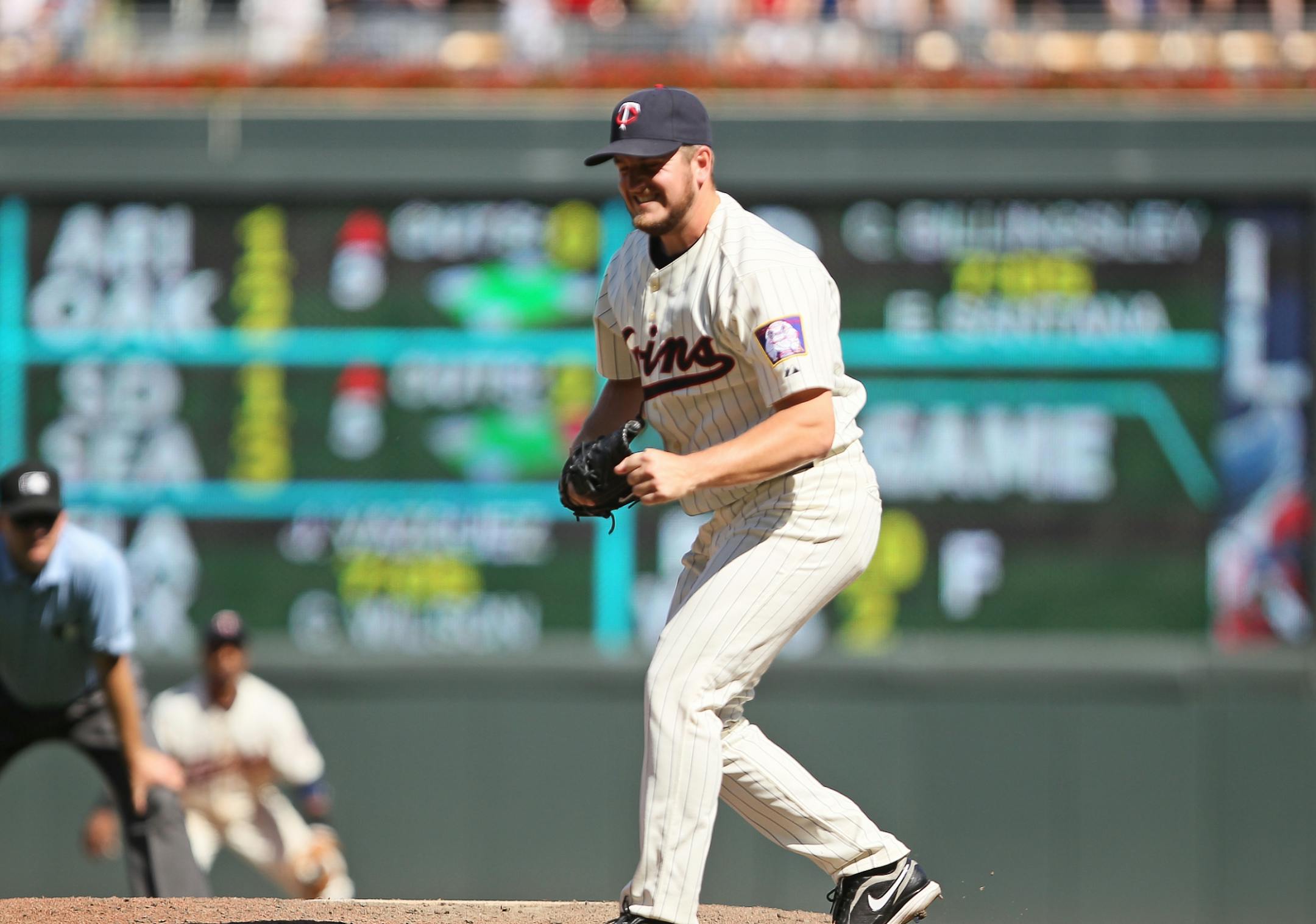 Twins lefthander Glen Perkins rode to the rescue Sunday, striking out Brewers Prince Fielder and Casey McGehee to finish a 9-7 victory at Target Field.