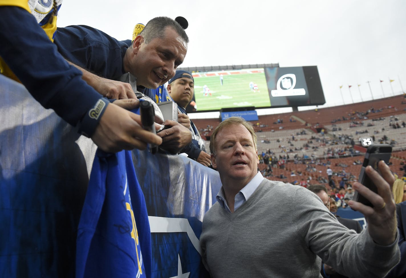 NFL Commissioner Roger Goodell poses with fans before an NFL football wild-card playoff game between the Los Angeles Rams and the Atlanta Falcons Saturday, Jan. 6, 2018, in Los Angeles. (AP Photo/Mark J. Terrill) ORG XMIT: OTKCC36708