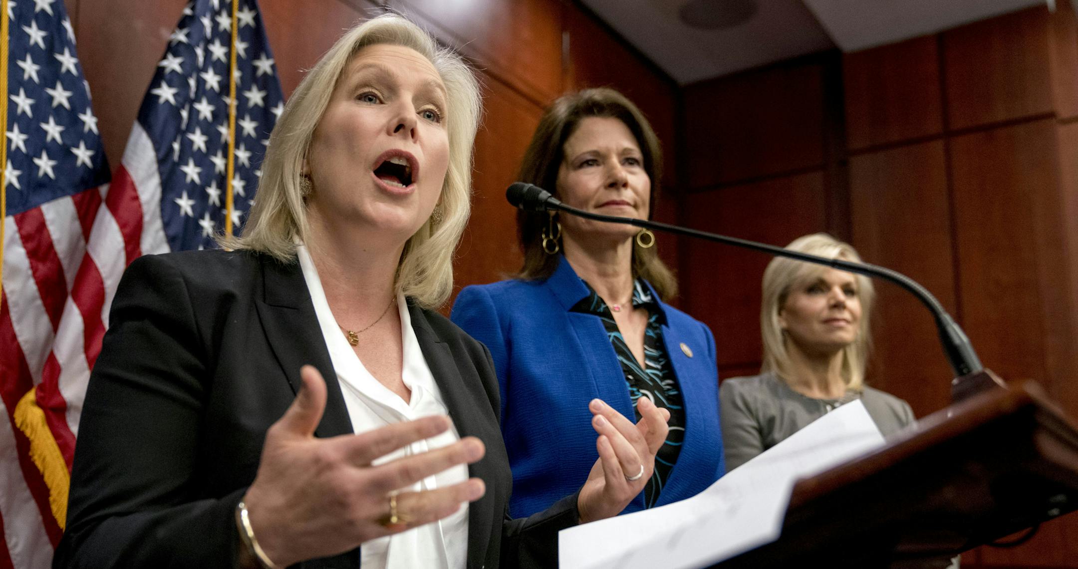 From left, Sen. Kirsten Gillibrand, D-N.Y., accompanied by Rep. Cheri Bustos, D-Ill., and former Fox News host Gretchen Carlson, speaks at a news conference where she and other members of congress introduce legislation to curb sexual harassment in the workplace, on Capitol Hill, Wednesday, Dec. 6, 2017, in Washington. Gillibrand and fellow female Democratic senators have united in calling for Sen. Al Franken to resign amid sexual misconduct allegations. (AP Photo/Andrew Harnik)