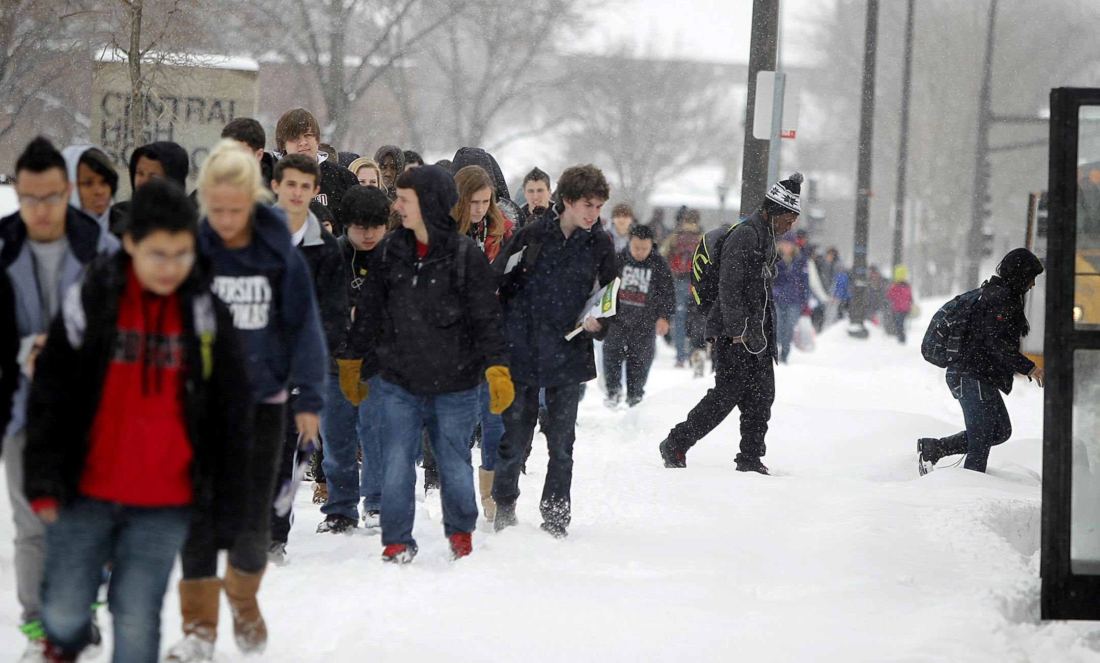 Central High School students made their way to the school buses after being released early due to the weather Tuesday, March 5, 2013 in St. Paul.