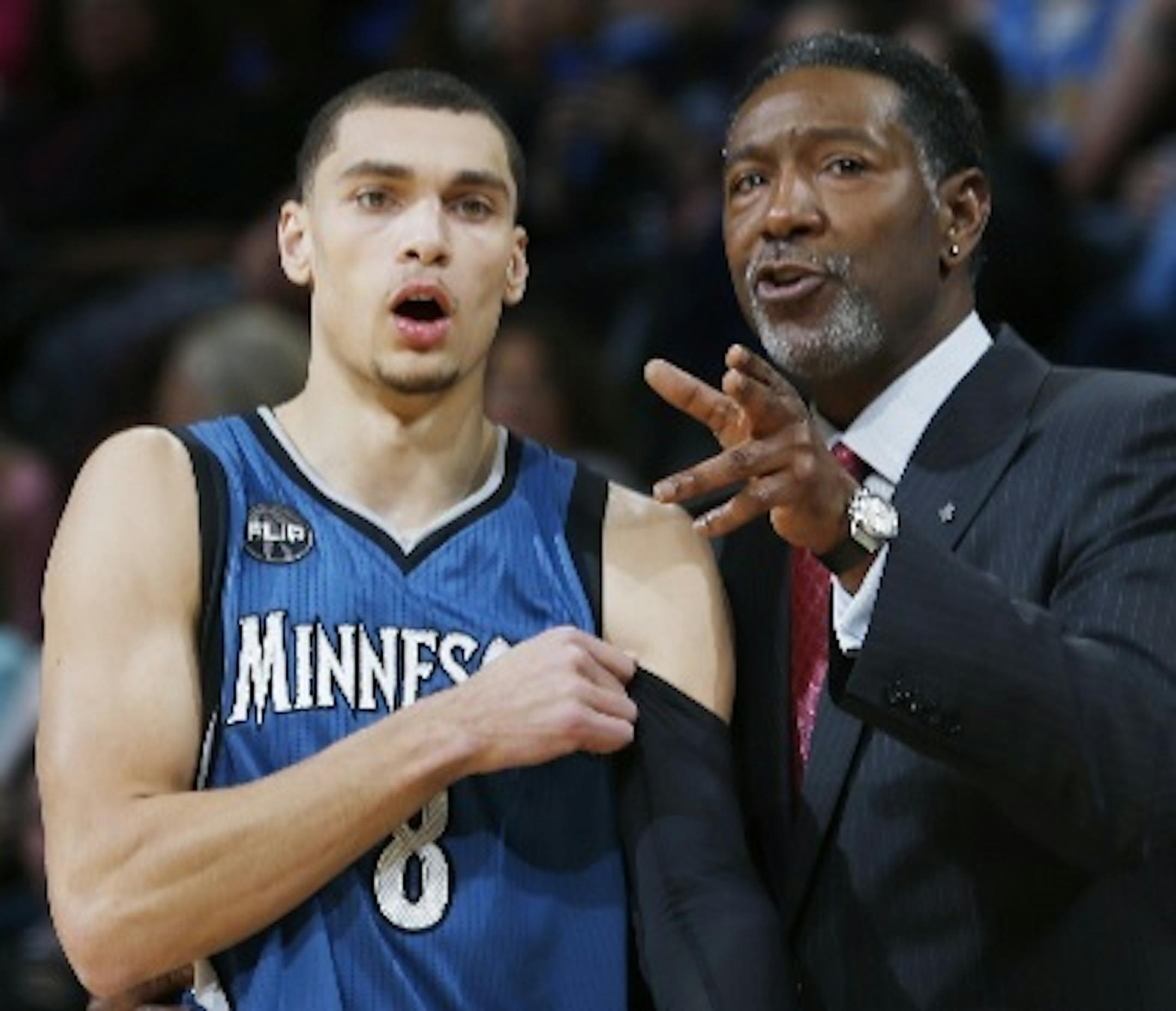 Timberwolves interim coach Sam Mitchell, right, conferred with guard Zach LaVine.