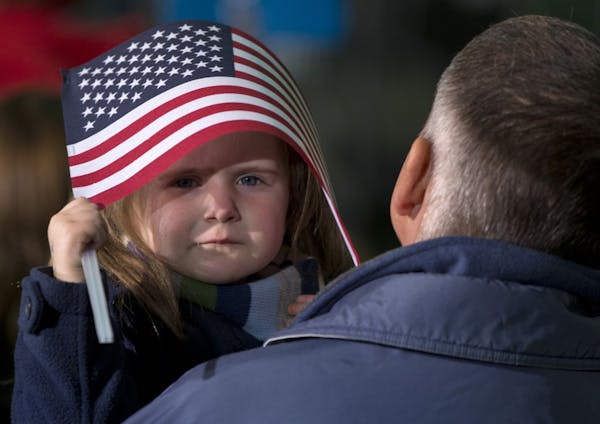 A little girl at a campaign rally in Ohio.