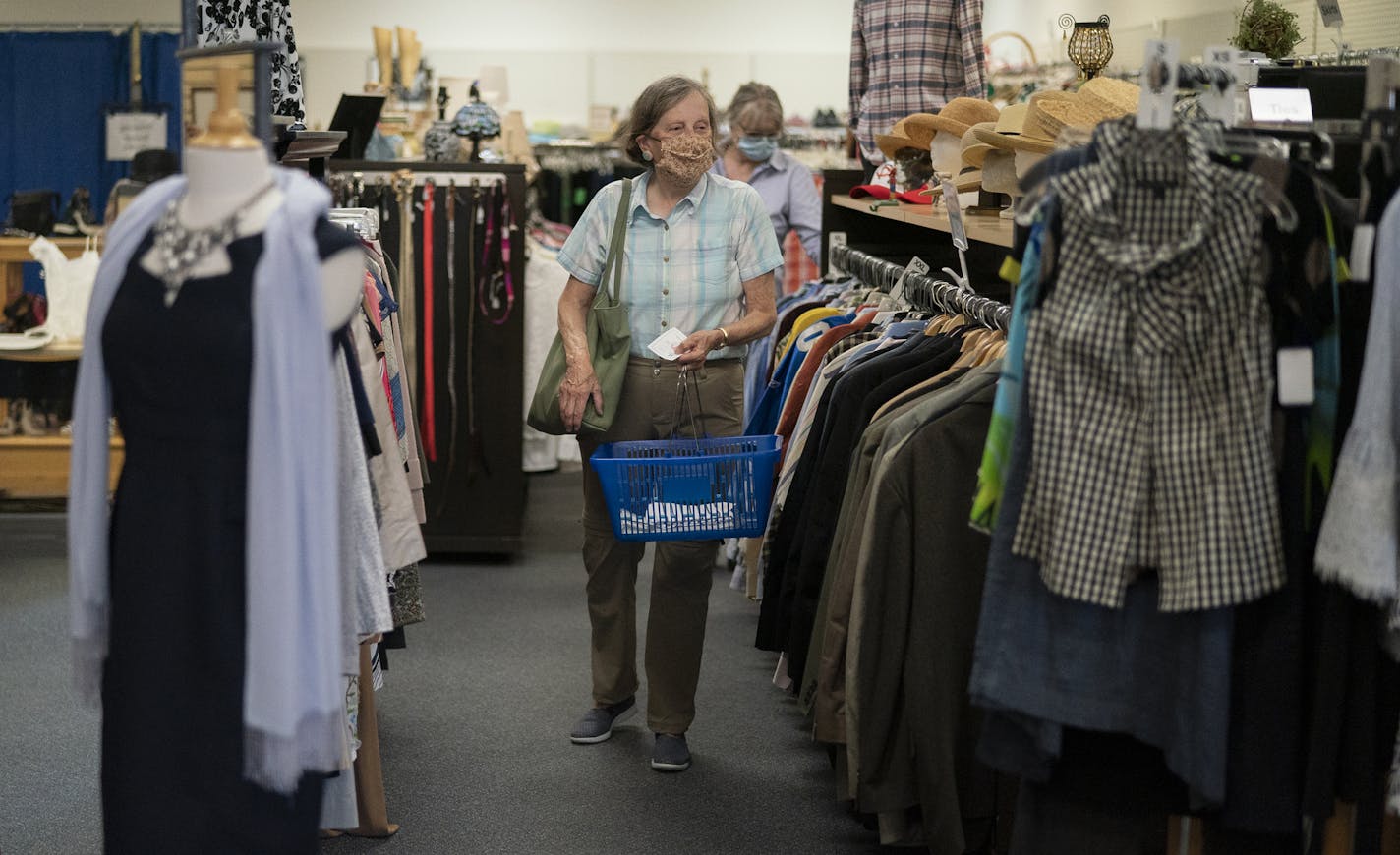 Diana Monaghan was the second in line this morning when the Assistance League Thrift store opening for the first time since the COVID shutdown .] Jerry Holt •Jerry.Holt@startribune.com Assistance League Thrift store opening for the first time since the COVID shutdown July 15th , 2020 in Richfield ,MN.