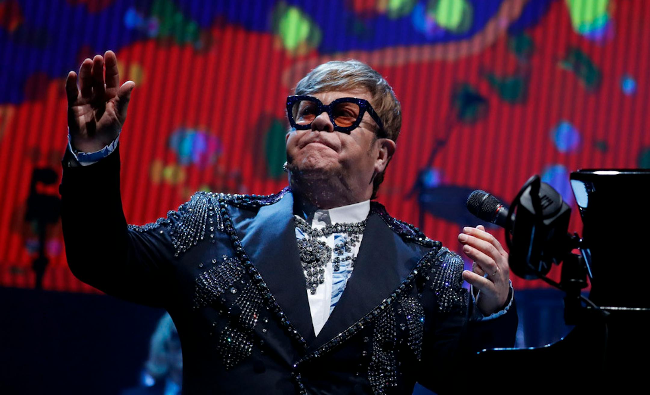 Rock legend Elton John acknolwdges the applause from a sold-out crowd during the first of several farewell performances at Staples Center in Los Angeles on Tuesday night, Jan. 22, 2018. (Luis Sinco/Los Angeles Times/TNS) ORG XMIT: 1264926