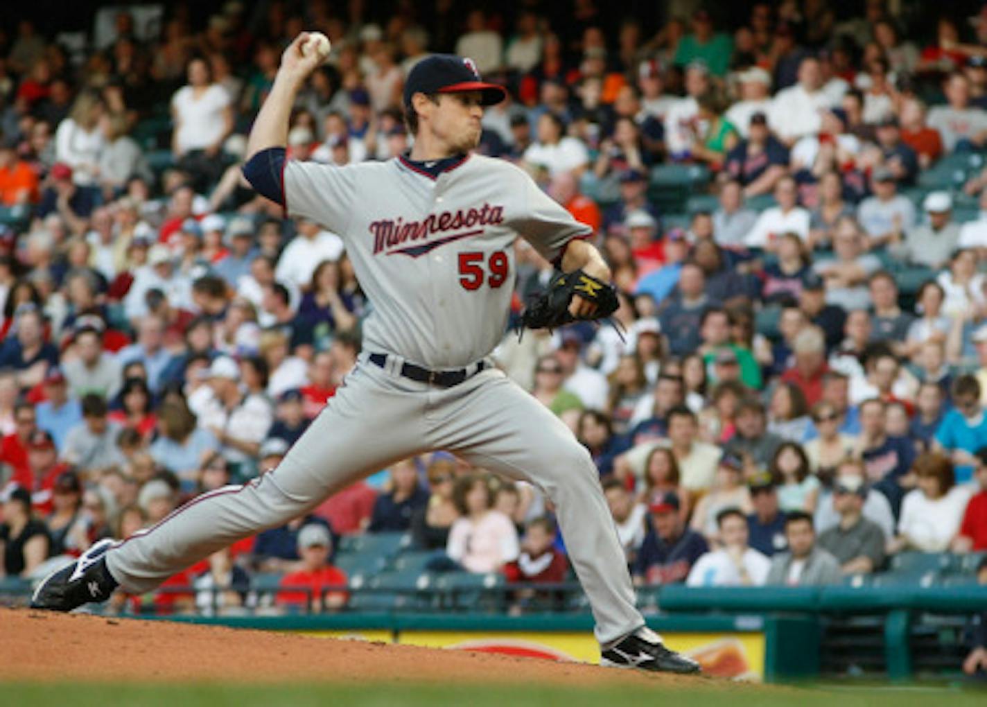 CLEVELAND, OH- APRIL 30:Kevin Slowey #59 of the Minnesota Twins pitches against the Cleveland Indians during the game on April 30, 2010 at Progressive Field in Cleveland, Ohio.  (Photo by Jared Wickerham/Getty Images)