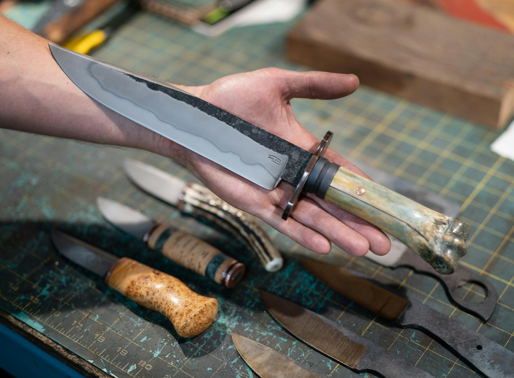 Jason Kraus made this Rifelman Bowir Knife for a client. The handle is zebra bone.