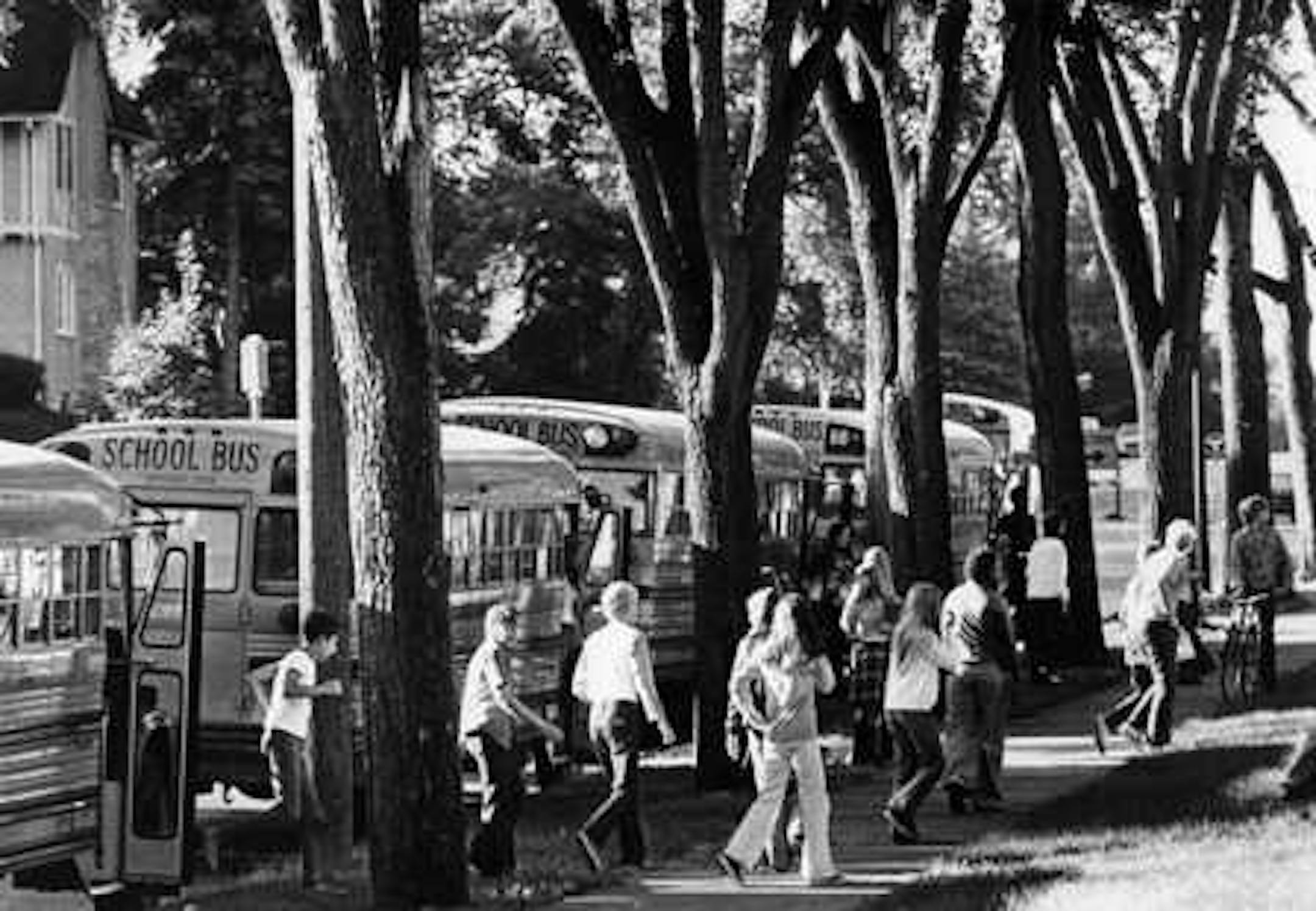 1973: The orange buses were lined up at Ramsey Junior High School, 49th St. and Nicollet Av. (photo by Richard Olsenius)