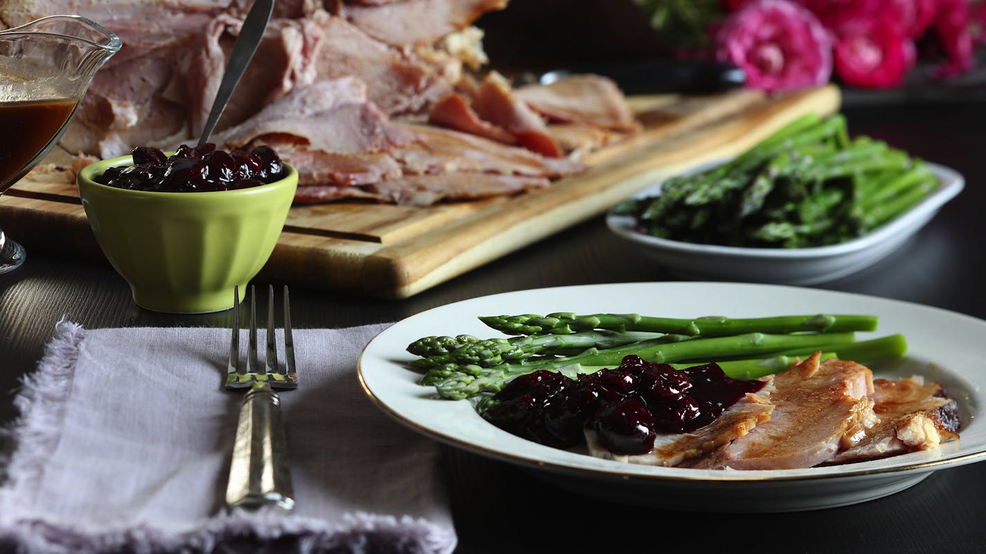 Instead of using a sweet glaze on the Easter ham, this recipe calls for a homemade cherry chutney, which brings sweet and tart notes. (Abel Uribe/Chicago Tribune/TNS) ORG XMIT: 1301795