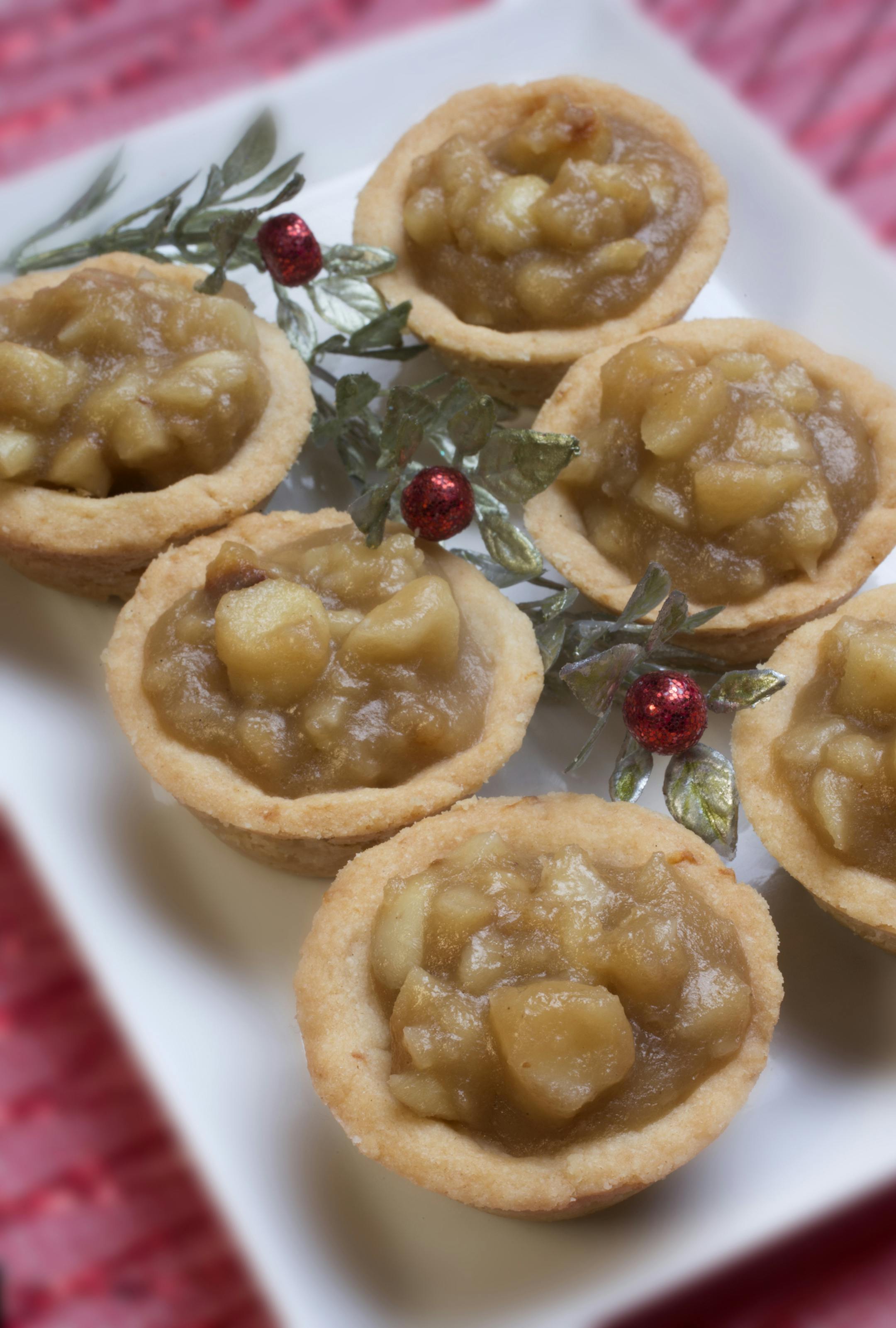 Caption for cookies: The 2014 Taste holiday cookie contest winners include: Italian Almond Cookies, Tart & Sassy Cranberry Lemon Drops; Chocolate Thumbprints; Macadamia Nut Tarts and Espresso-Hazelnut Truffle Cookies. The annual Star Tribune cooky contest