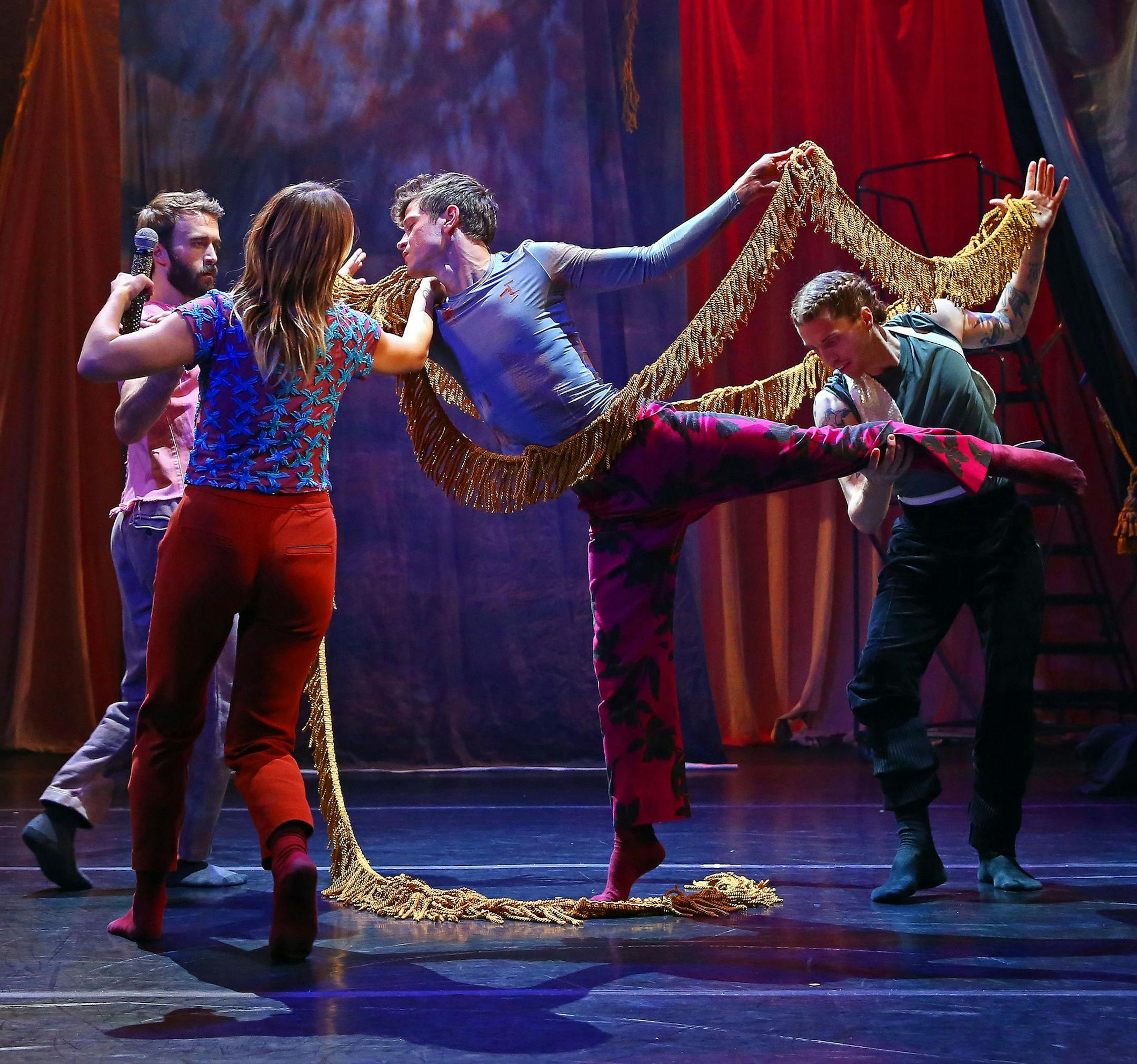 Mike Hadreas, center, in “The Sun Still Burns Here,” at the Joyce Theater in New. York, Nov. 13, 2019. Hadreas, who goes by the stage name of Perfume Genius, is serious about unleashing his inner dancer — so much so that he teamed up with the choreographer Kate Wallich to create “The Sun Still Burns Here,” an evening-length work in which he sings and dances. (Andrea Mohin/The New York Times)
