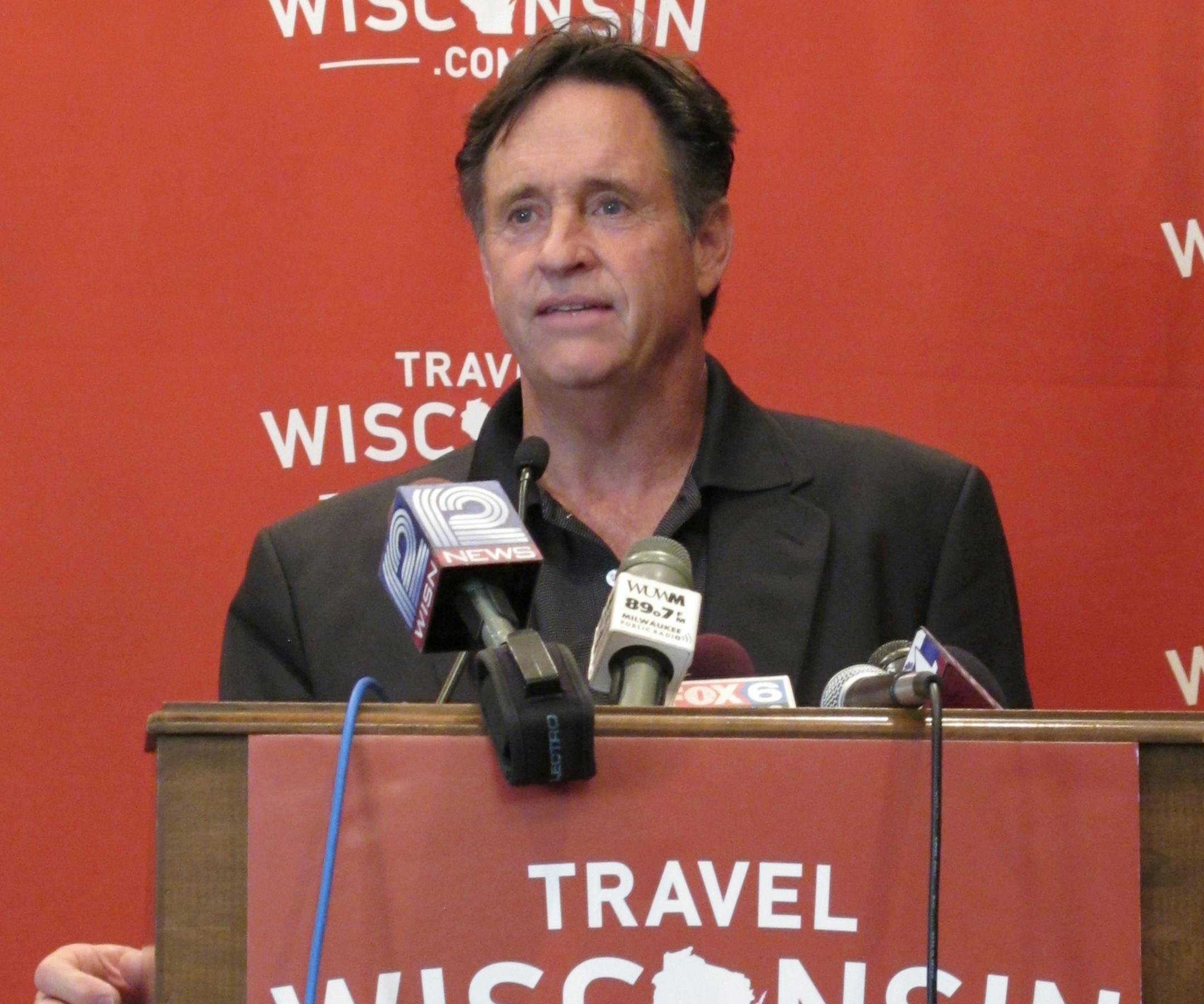 Actor Robert Hays speaks at a press conference in Milwaukee on Monday, June, 25, 2012. Hays is starring in a new summer tourism commercial for the state, which is being directed by David Zucker. Zucker last directed Hays in the 1980 movie "Airplane!" (AP Photo/Carrie Antlfinger) ORG XMIT: RPCA102