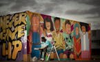 Geno Okok is painting a mural in Brooklyn Park that will showcase the city's diversity and say "We Love Brooklyn Park." The mural is located near the 