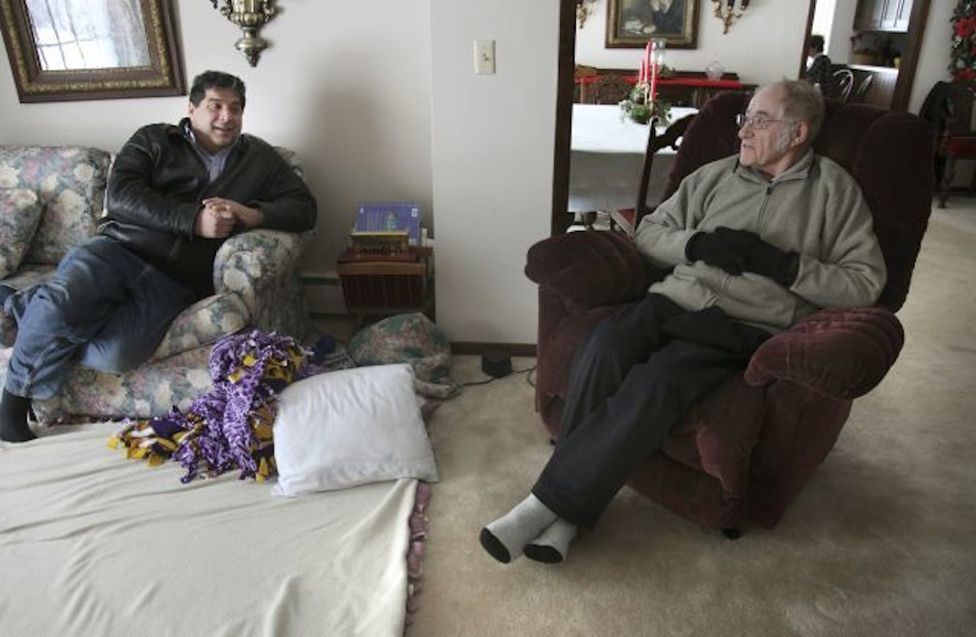 Rod Tietz visited with his father Rollie Tietz at their home in rural New Prague.