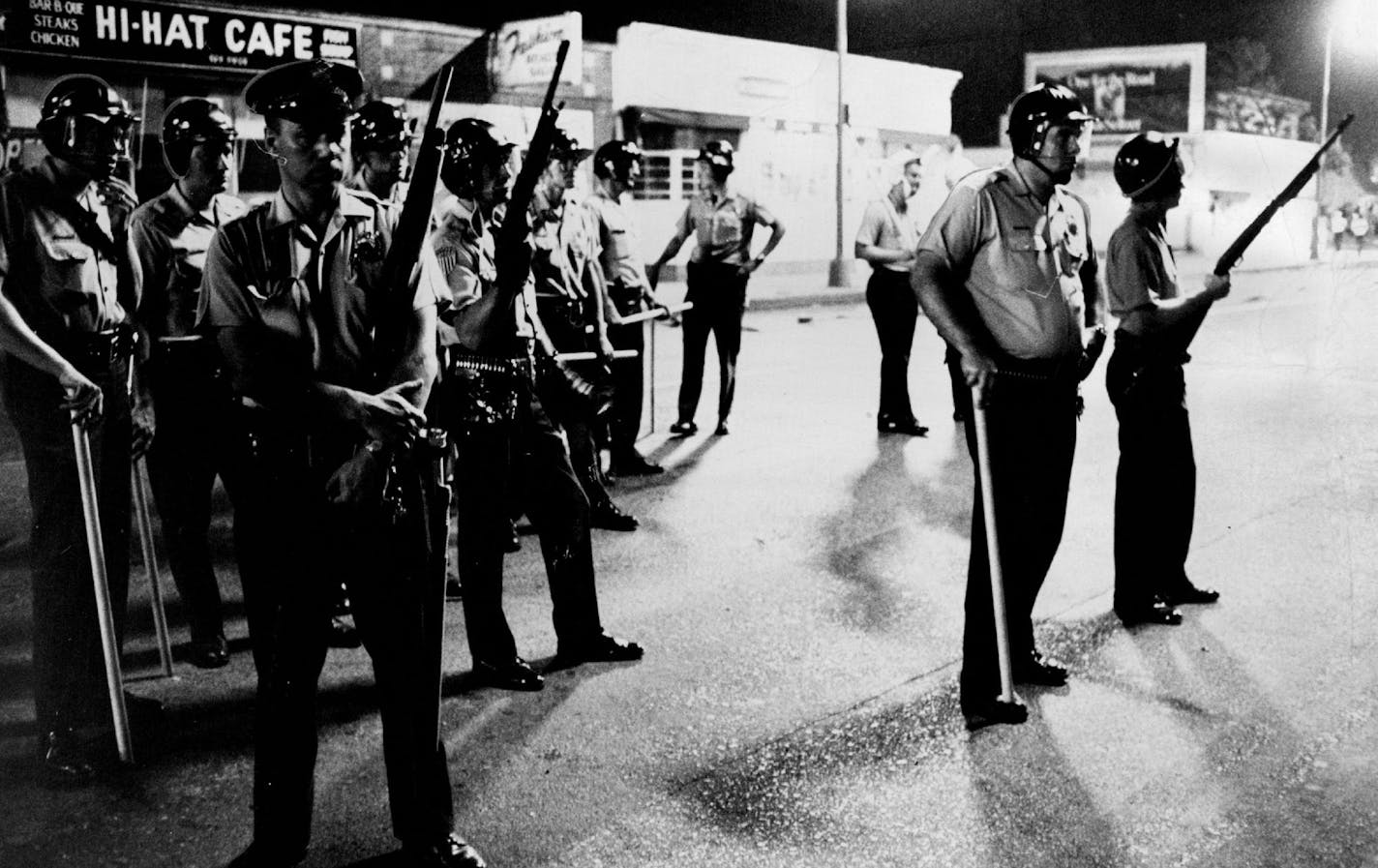 Armed policemen watched and waited along Plymouth Avenue in July 1967