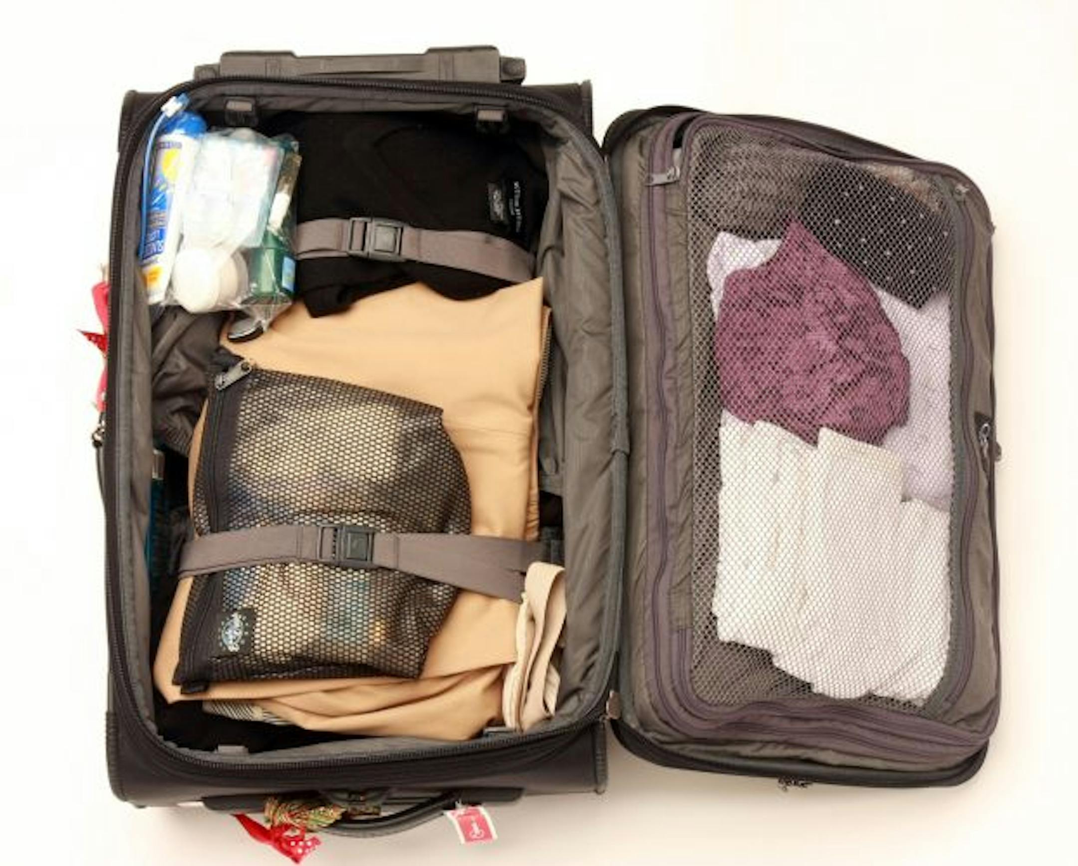 Merle Minda demonstrates packing a carry-on bag for a 31 day European trip.