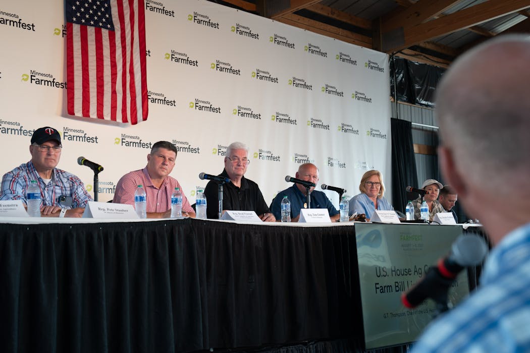 A United States House Ag committee holds a listening session at Farmfest that included from left, Rep. Pete Stauber, Rep. Brad Finstad, Rep. Tom Emer, Iowa Rep. G.T. Thompson, Rep. Michelle Fischbach and Rep. Angie Craig.