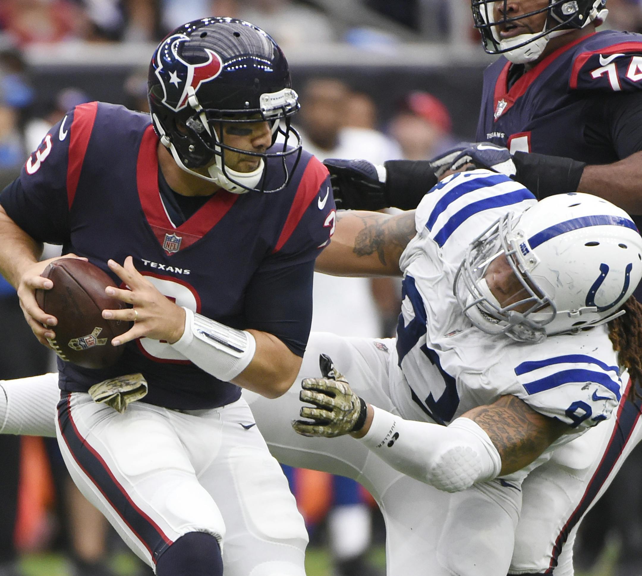 Houston Texans quarterback Tom Savage (3) is hit in the backfield by Indianapolis Colts outside linebacker Jabaal Sheard (93) during the second half of an NFL football game Sunday, Nov. 5, 2017, in Houston. (AP Photo/Eric Christian Smith)