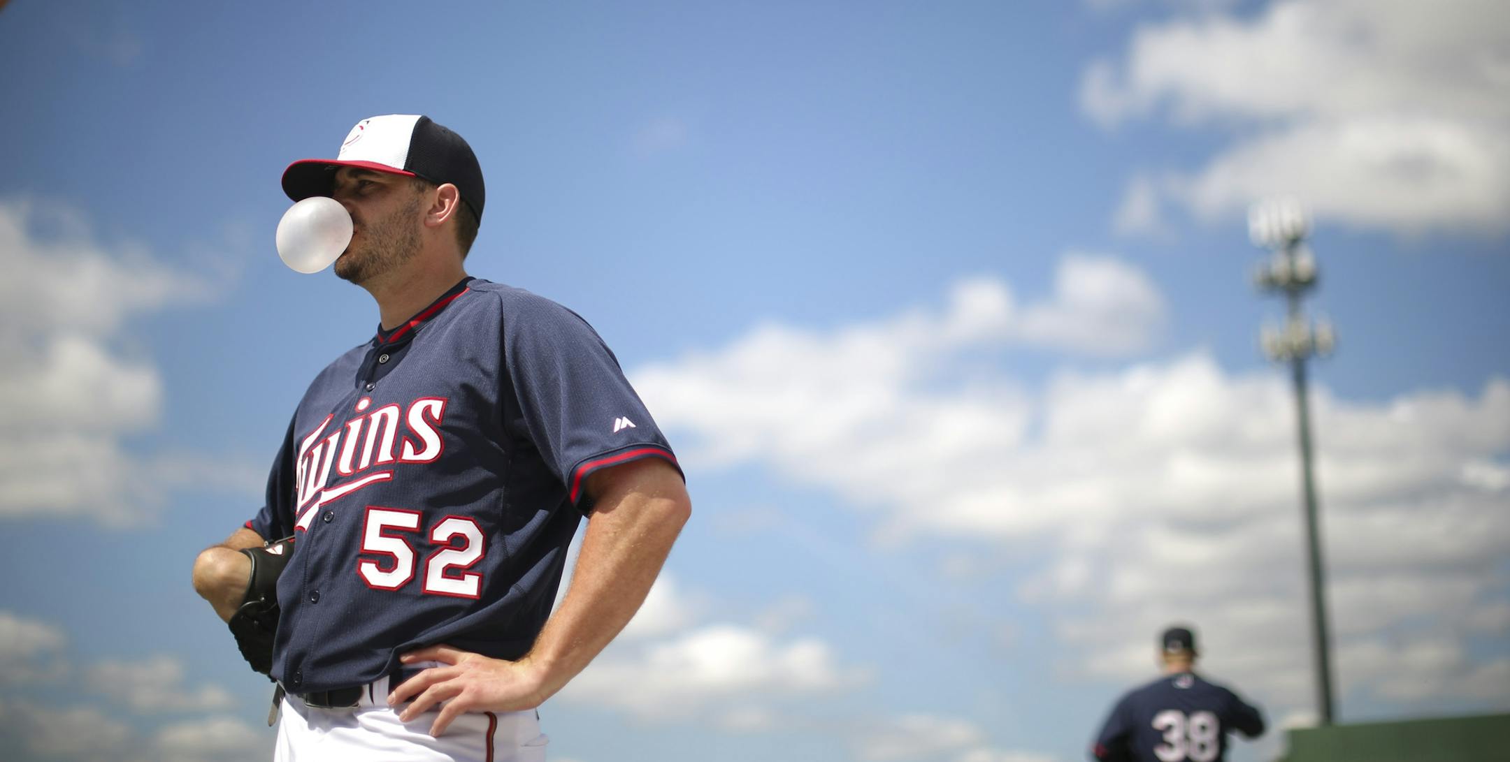 Twins pitcher Brian Duensing talked with coach Eric Rasmussen, the team's minor league pitching coordinator, Tuesday afternoon at Hammond Stadium. ] JEFF WHEELER &#xef; jeff.wheeler@startribune.com The Twins held another spring training workout Tuesday morning, March 3, 2015, at Hammond Stadium in Fort Myers, FL.