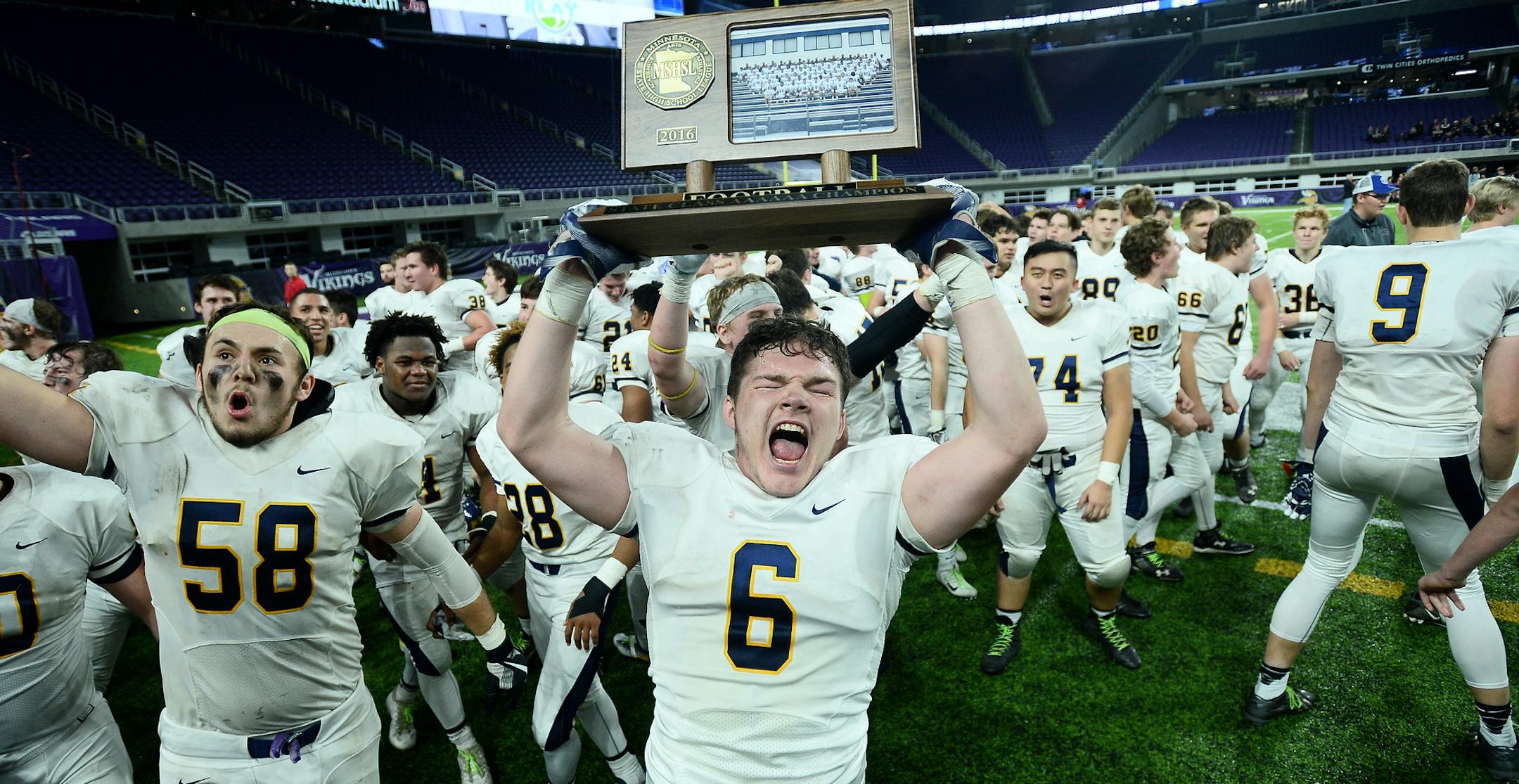 Totino Grace fullback Brady Bertram ( 6) celebrated with his team's 6A championship victory after defeating Eden Prairie Friday night. ] (AARON LAVINSKY/STAR TRIBUNE) aaron.lavinsky@startribune.com Eden Prairie played Totino Grace in the Class 6A Championship Game of the the Prep Bowl on Friday, Nov. 25, 2016 at U.S. Bank Stadium in Minneapolis, Minn.