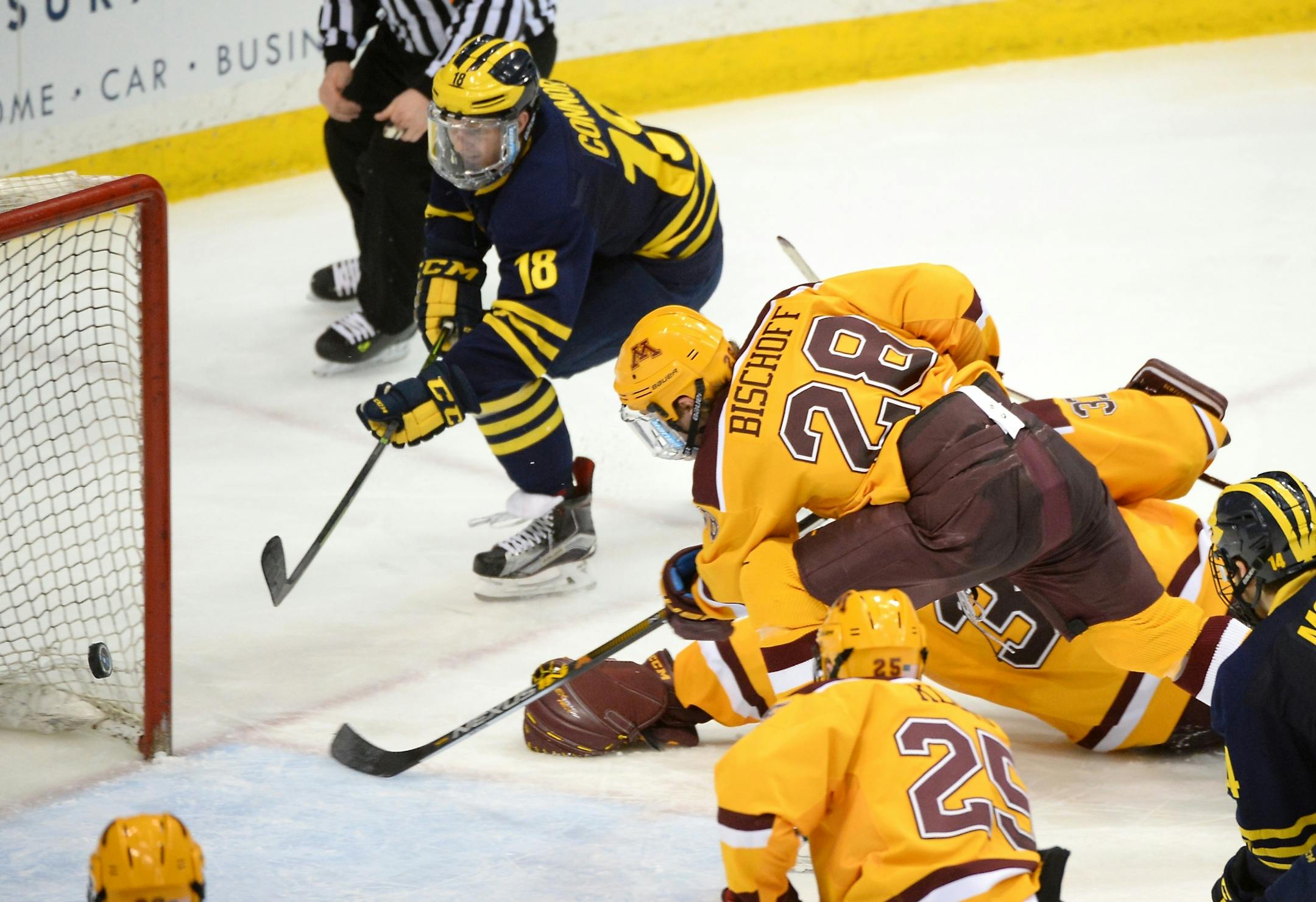 Michigan Wolverines forward Kyle Connor (18) scored a goal on the Minnesota Golden Gophers in the third period.