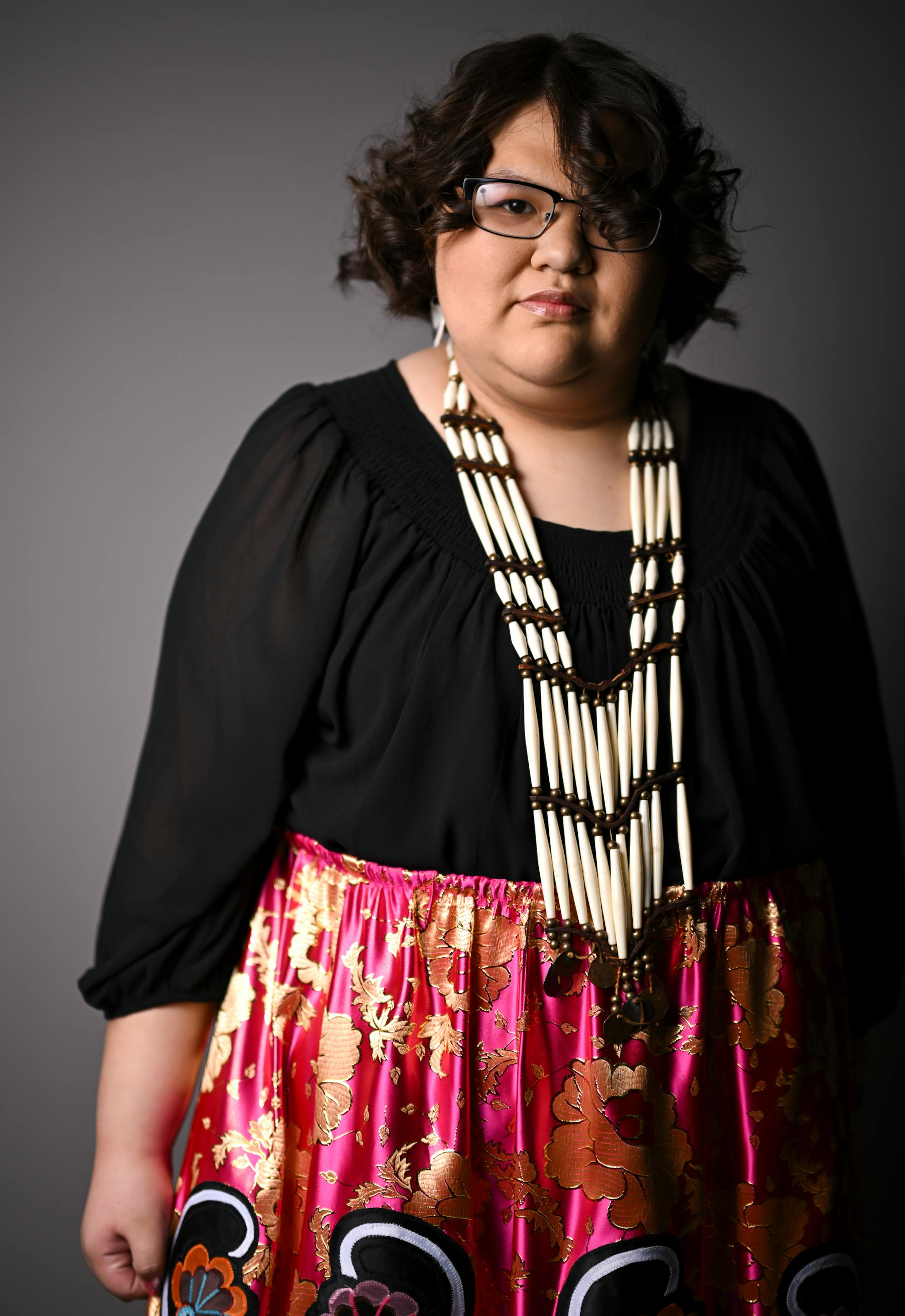 Deer River High School senior Autumn Bunker stands for a portrait during "Northern Lights: A Native Nations Fashion Night." Bunker is part of the Anishinaabe Education Leadership Group and worked on designing and producing apparel with artist Delina White of "IamAnishinaabe."