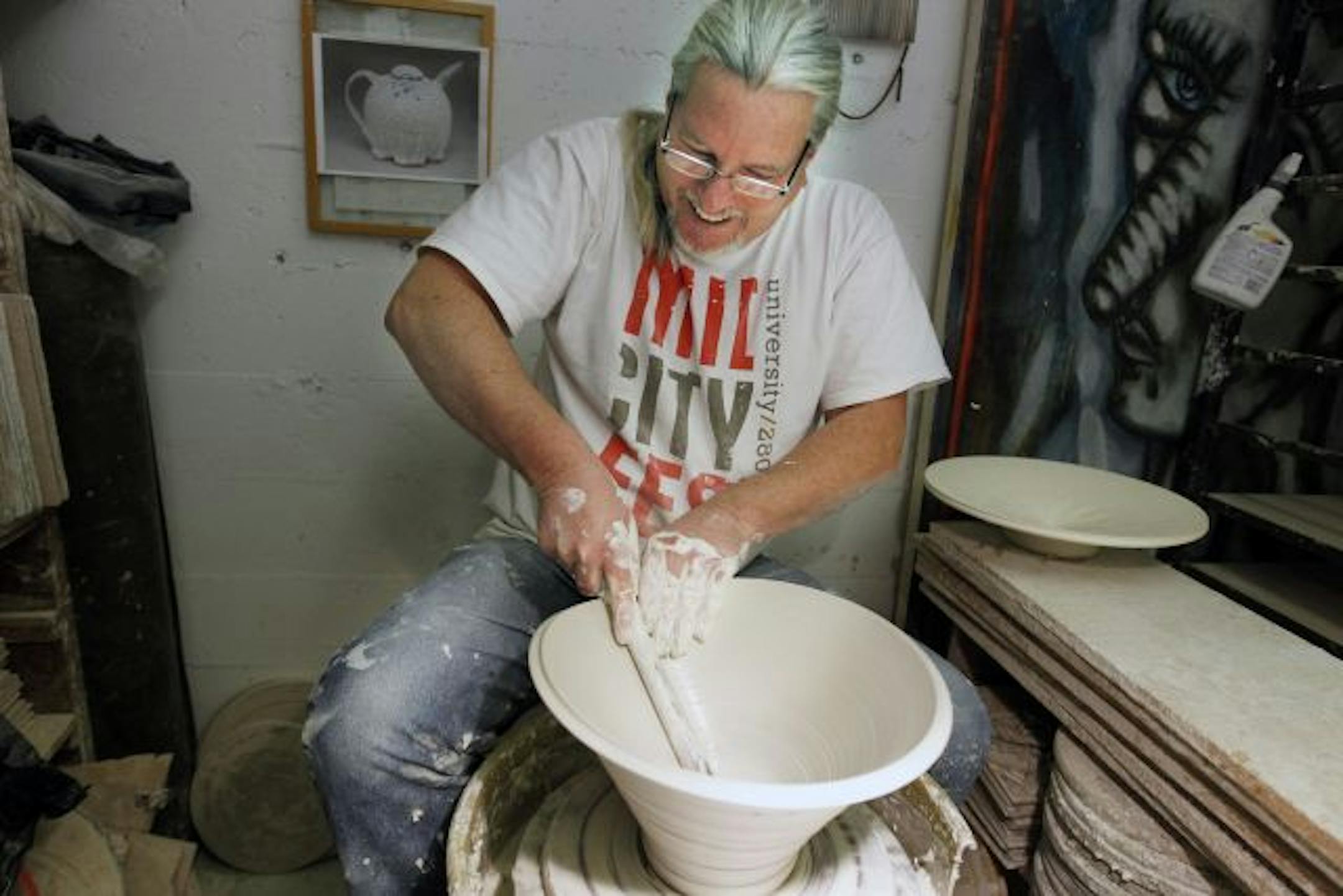 At Carleton Artist Lofts in St. Paul, Kevin Caufield worked on some pottery for his upcoming show.