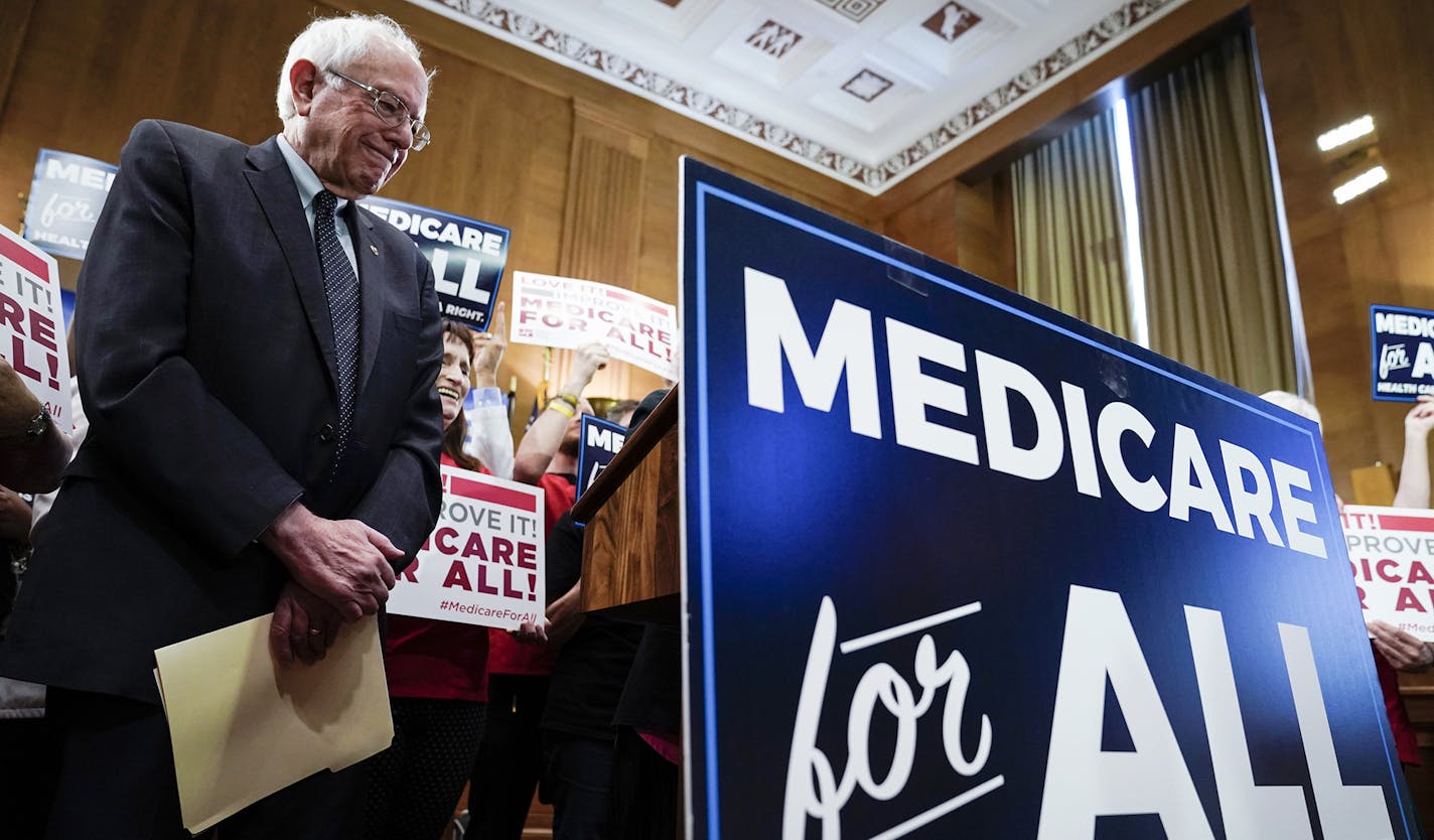 FILE -- Sen. Bernie Sanders (I-Vt.), a democratic presidential primary contender, at a news conference reintroducing Sanders' Medicare for All Act, at a senate office building in Washington, April 10, 2019. Amid intense political debate over proposals from the leading candidates, studies have reached drastically different conclusions about a single-payer system&#x2019;s price tag, cost to families and effect on the health system. (Sarah Silbiger/The New York Times)