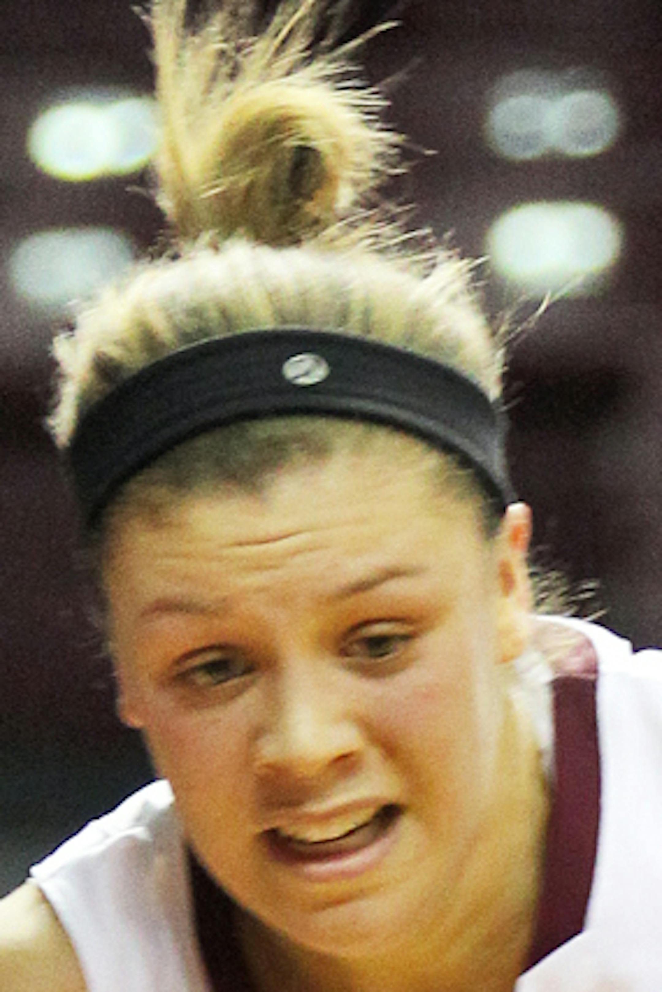 Minnesota Gopphers vs. Michigan Womens basketball. Minnesota's Rachel Banham drove to the basket around the defense of Michigan's Rachel Sheffer (44). (MARLIN LEVISON/STARTRIBUNE(mlevison@startribune.com (cq -all names program.)