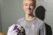 Cretin-Derham Hall's Owen Nelson, with the goalie mask that reflects his culture.