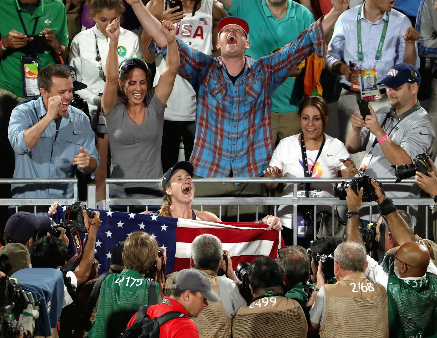 USA's Kerri Walsh Jennings and April Ross won their bronze medal match against Larissa Franca Maestrini and Talita Rocha from Brazil. Here, Walsh Jennings celebrates her win and amazing carreer with fans and friends. ] 2016 Summer Olympic Games - Rio Brazil brian.peterson@startribune.com Rio de Janeiro, Brazil - 08/17/2016