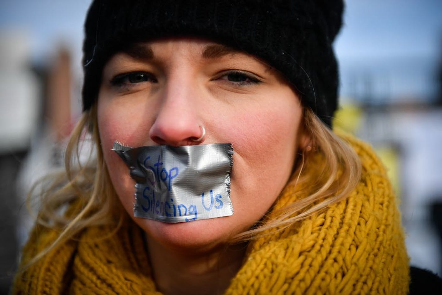 Megan Buchel, a senior global studies major, took part in Saturday afternoon's protest against sexual abuse and rape culture outside TCF Bank Stadium.