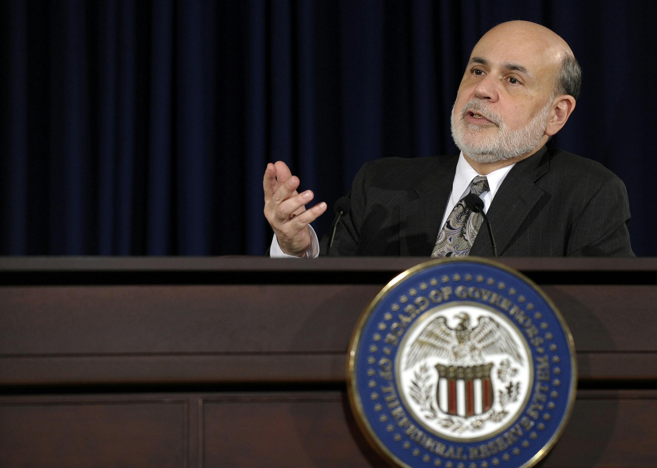 Federal Reserve Chairman Ben Bernanke speaks during a news conference at the Federal Reserve in Washington, Wednesday, Dec. 18, 2013. The Fed will begin to reduce bond purchases by $10 billion in January because of a stronger U.S. job market.(AP Photo/Susan Walsh)