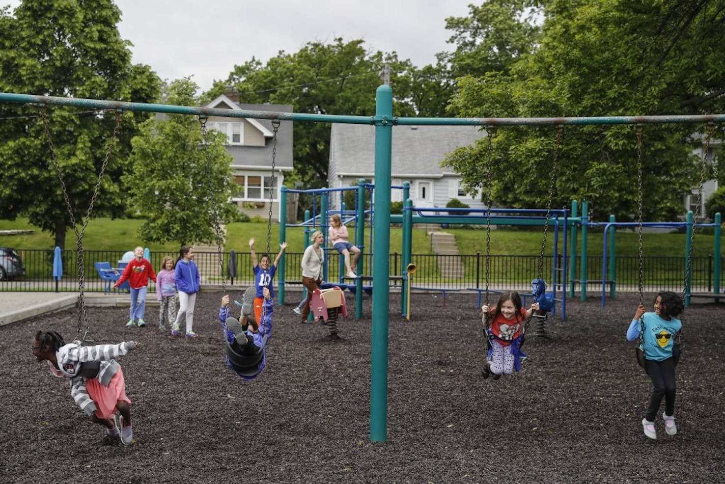 Children played on the playground during recess at Lake Harriet Community School lower campus on Tuesday, May 30, 2017.