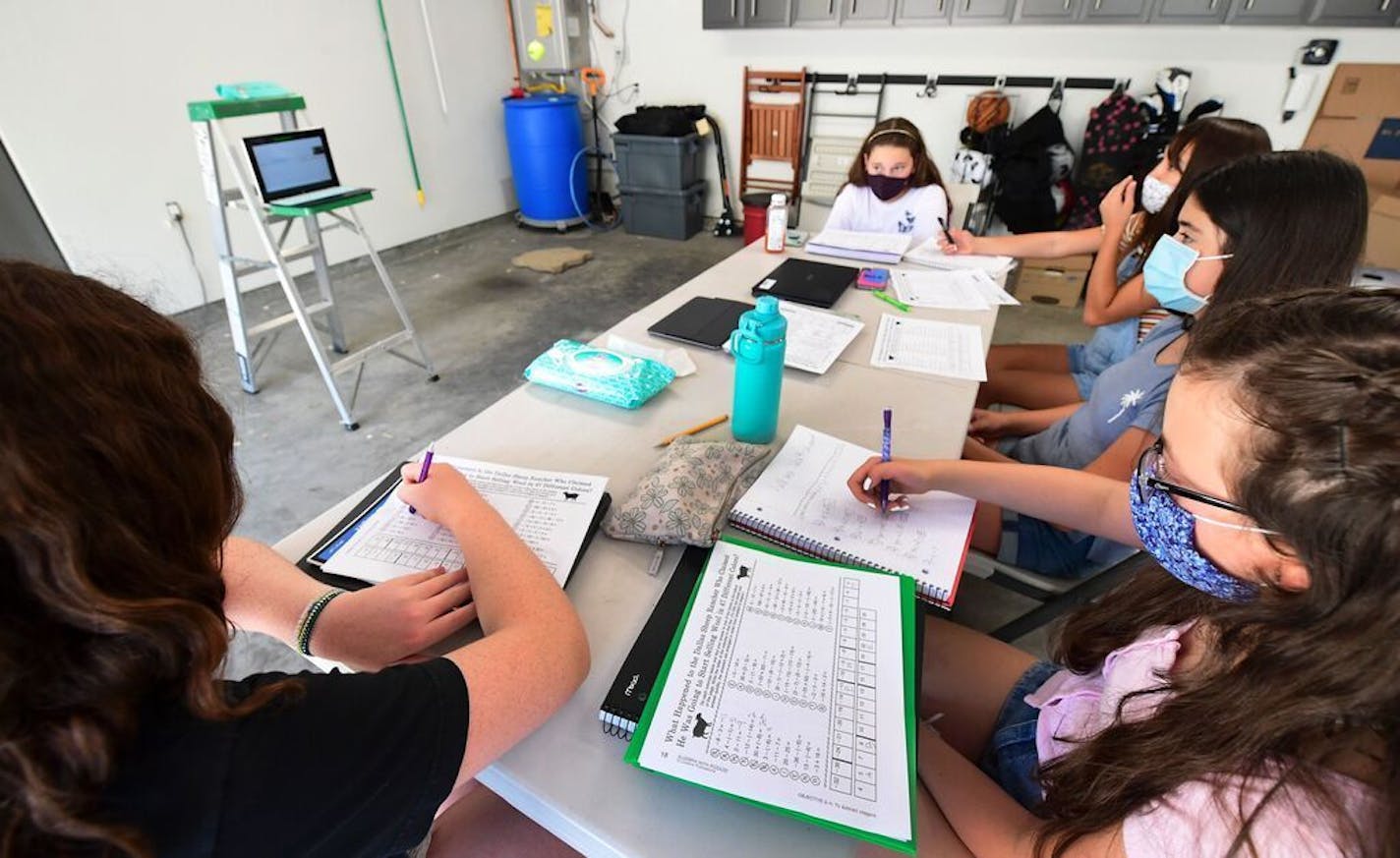 Seventh-grade students followed instructions online in a home garage in California.