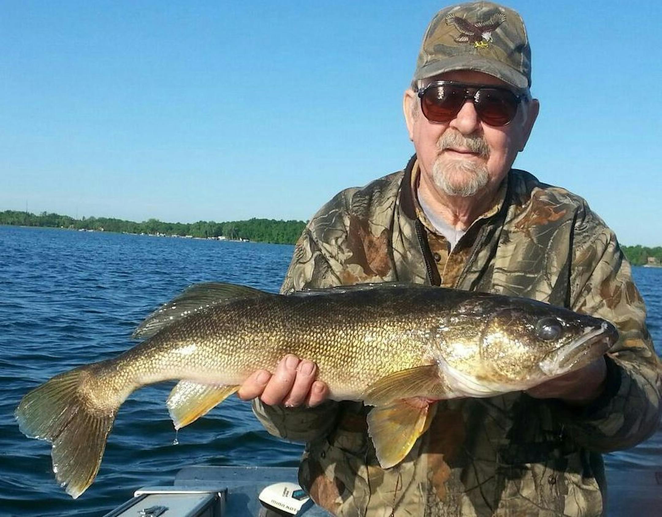 HIS LUNKER Mell Koenig, 80, of Alexandria finally caught his lunker walleye -- a 29.5-incher that weighed 9 1/2 pounds. He was fishing on Lake Le Homme Dieu in about 20 feet of water using a leach. It was released so another lucky angler can enjoy the catch.