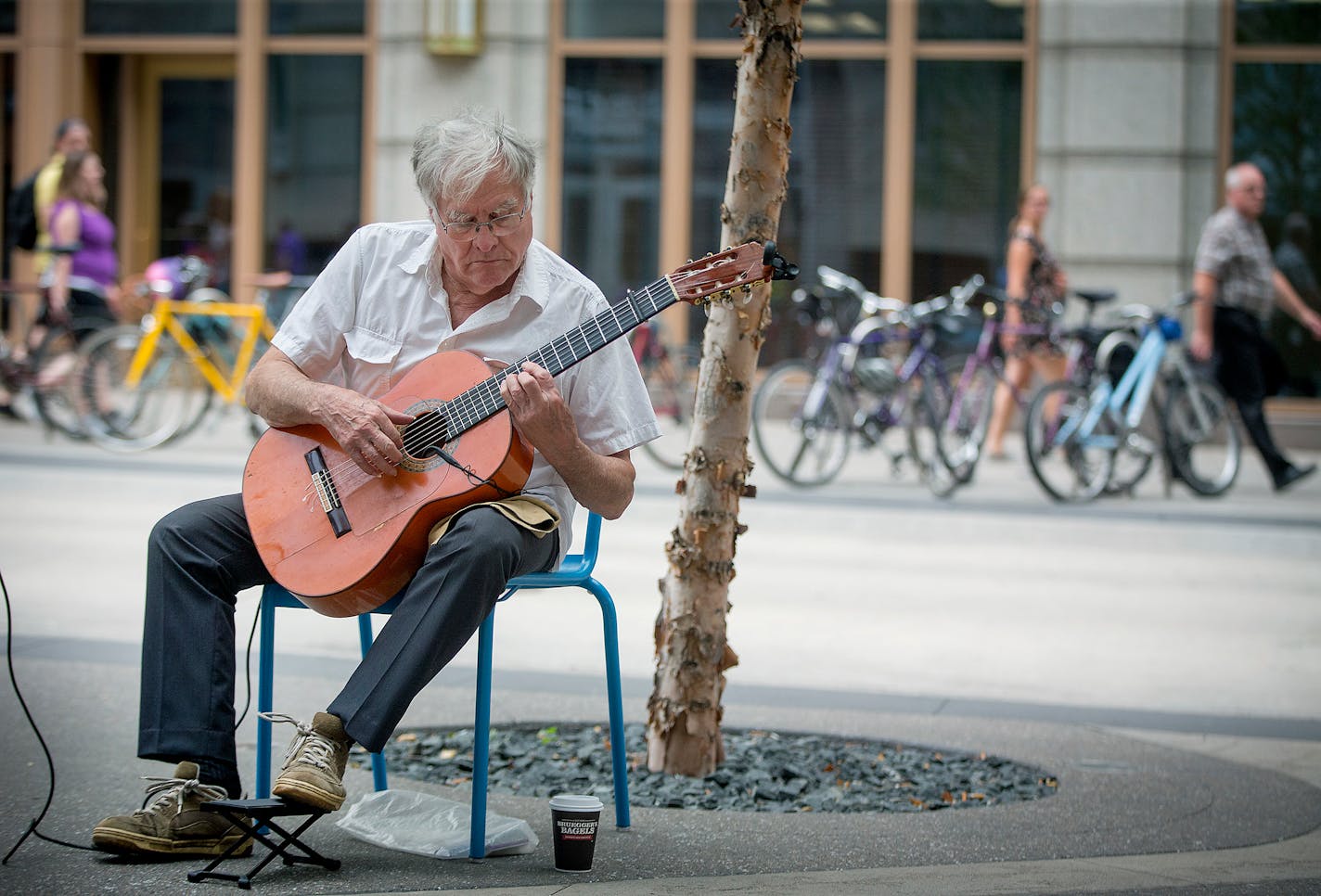 Michael Hauser, a profession musician and expert in flamenco guitar, performed along Nicollet Mall on Aug. 17.