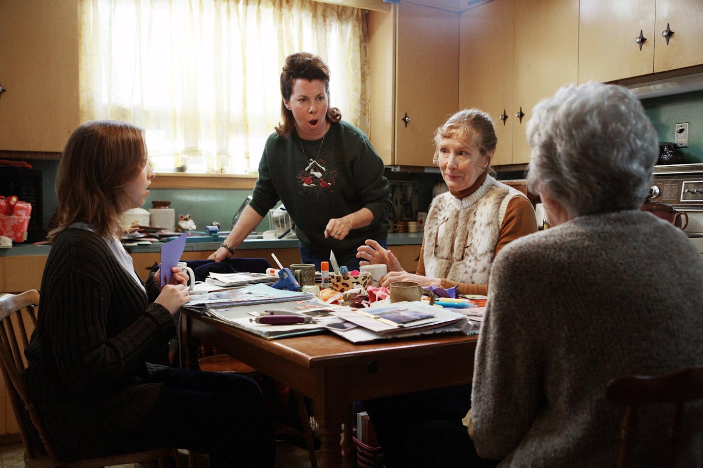 Blanche Gunderson (Siobhan Fallon Hogan, standing center) and Trudy Van Uuden (Frances Conroy, seated right) in NEW IN TOWN. Photo credit: Rebecca Sandulak/Lionsgate