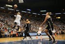 The Minnesota Lynx' Maya Moore makes a layup in the first quarter against the San Antonio Stars in Game 1 of the Western Conference semifinals at Targ