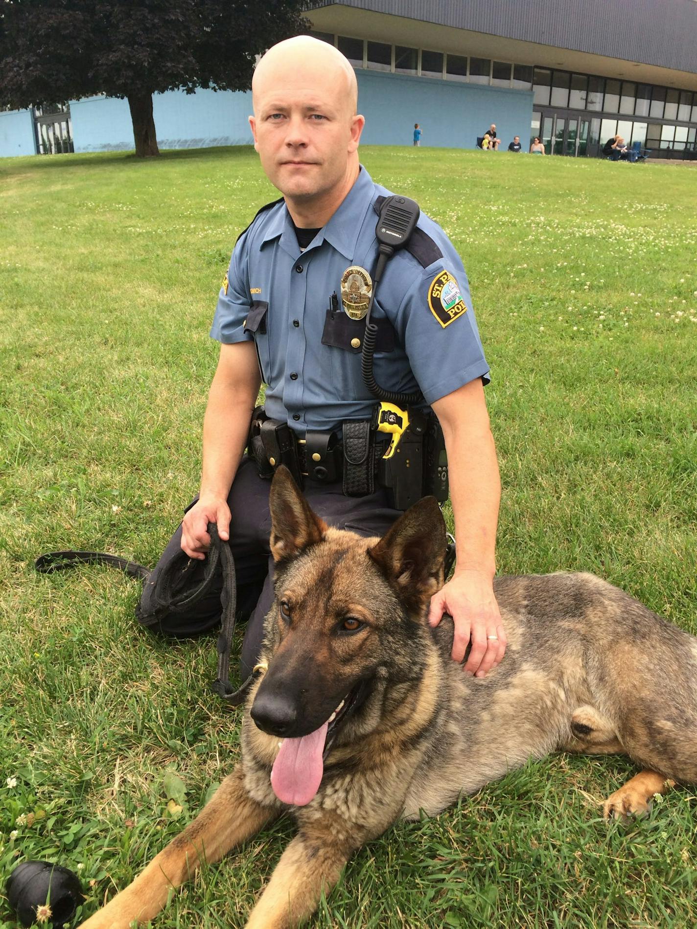 Former St. Paul Officer Shawn Filiowich with his K9 Cooper pose for a photo. Filiowich died of pancreatic cancer on Jan. 4, leaving a legacy of familial love and community respect.