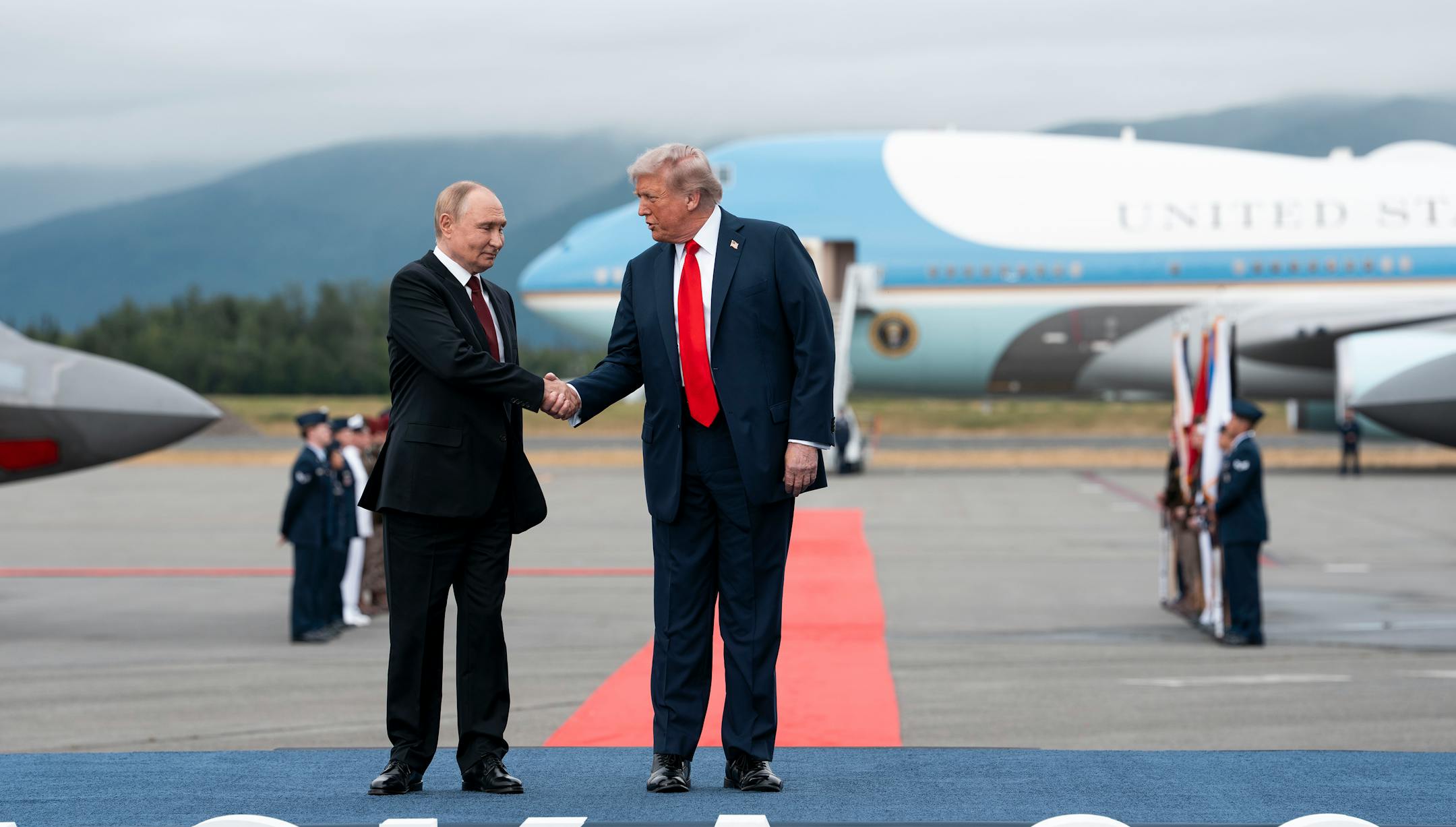 President Donald Trump greets Russian President Vladimir Putin as they meet at Joint Base Elmendorf-Richardson in Anchorage, Alaska, on Aug. 15.