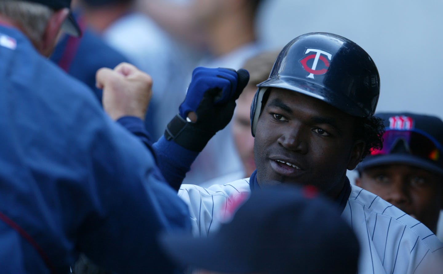 David Ortiz is congratulated on a first-inning home run for the Twins in 2002.