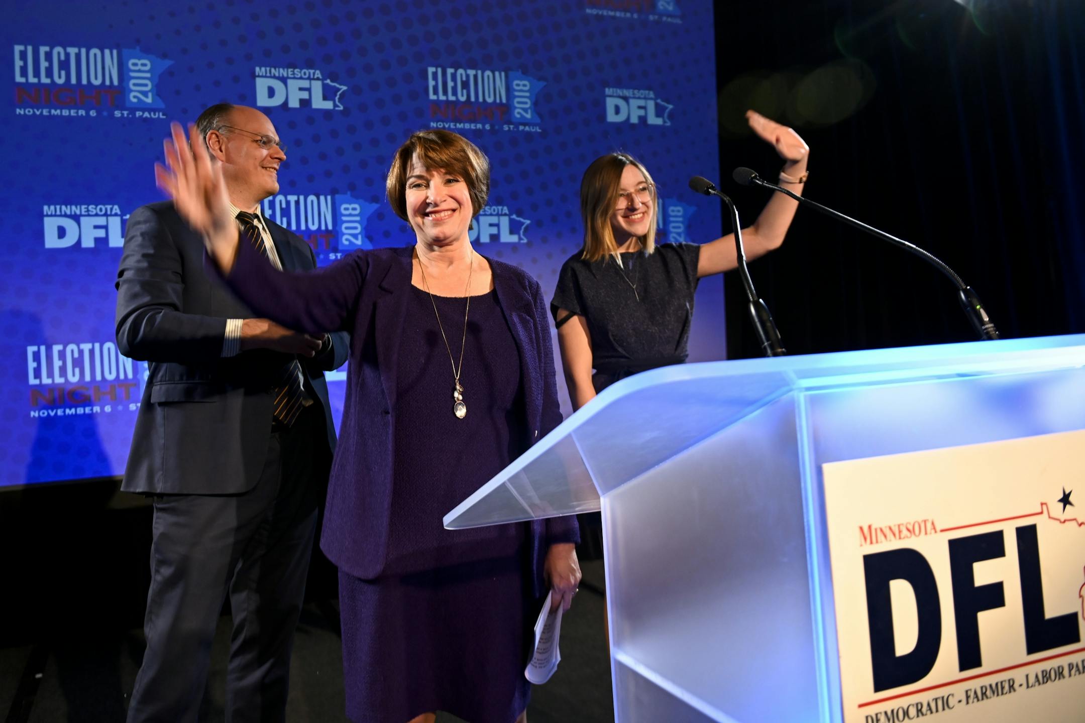 Sen. Amy Klobuchar stood beside her husband, John Bessler, and her daughter, Abigail, at the conclusion of her acceptance speech Tuesday night at the DFL headquarters election party in 2018.