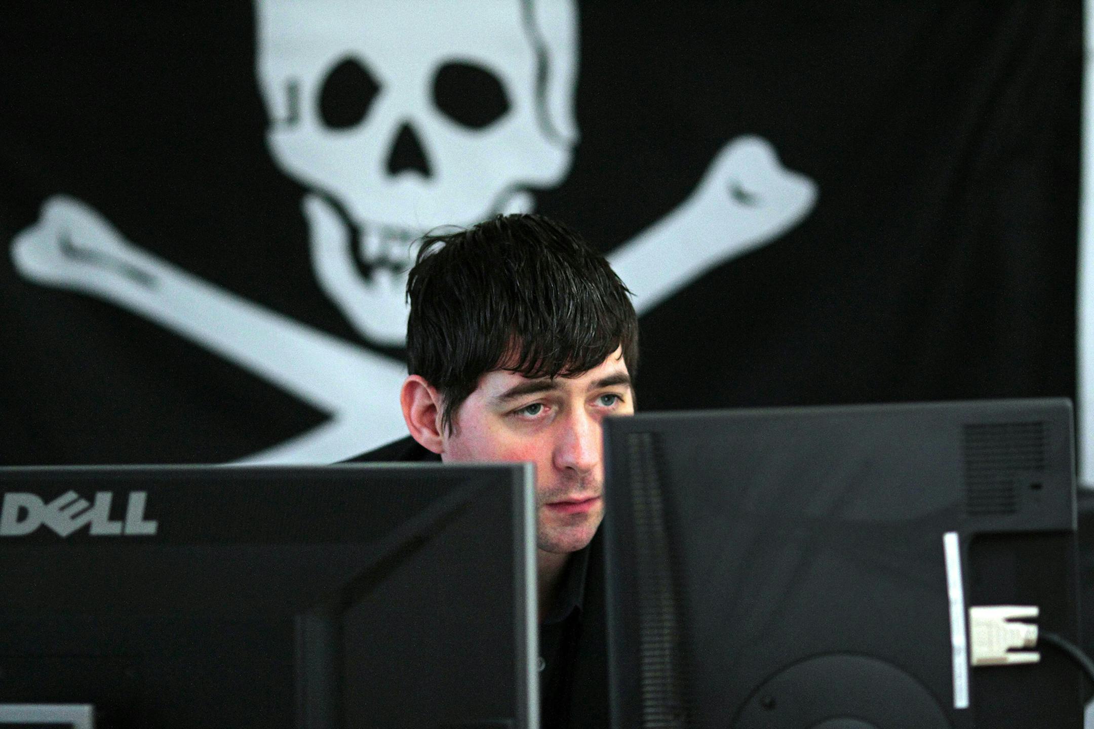 Adam Cecchetti, 31, one of the founders of Deja vu Security, which operates out of a loft on Capitol Hill, says that unlike hackers who are a menace to others, "I'm not in this business to harm people, or to take grandma's savings or deface someone's website." (Mark Harrison/Seattle Times/MCT) ORG XMIT: 1138099