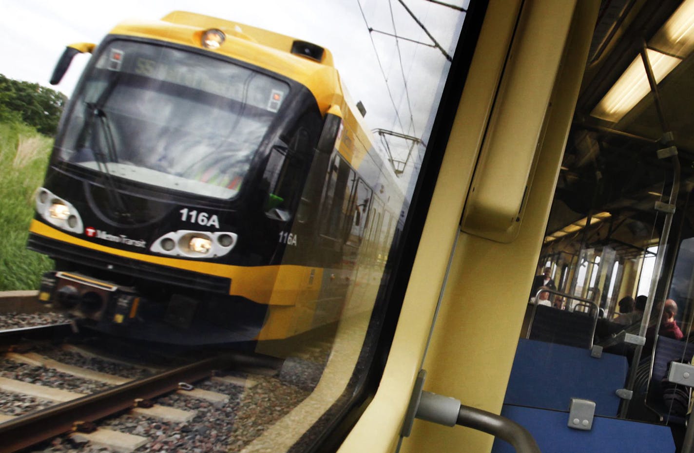 Riders take the light-rail during morning rush hour in Minneapolis.