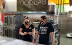 Dana Thompson, owner/COO, and Sean Sherman, founder of the Sioux Chef at the Indigenous Food Lab's new home in Midtown Global Market.